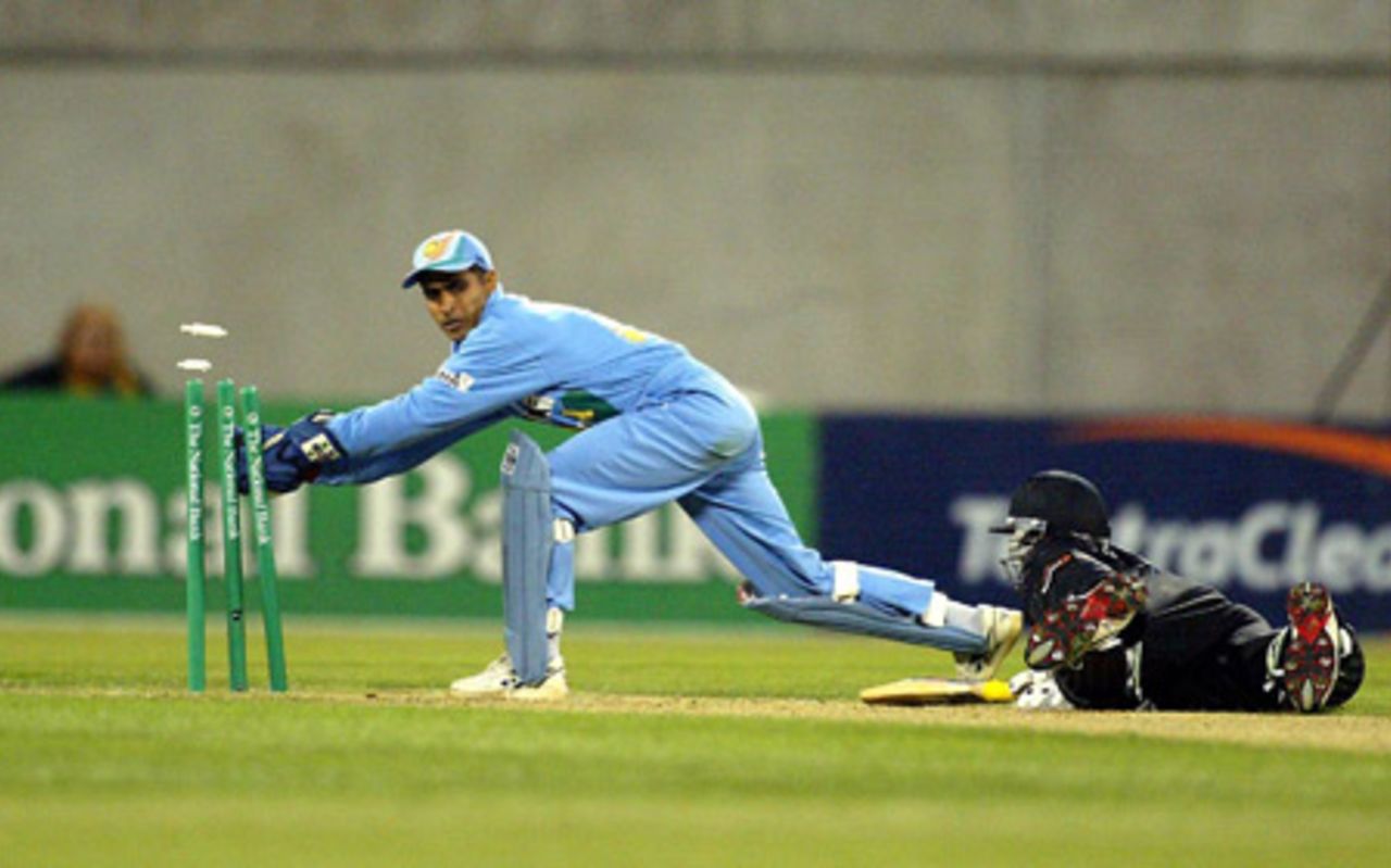 Indian wicket-keeper Ajay Ratra unsuccessfully attempts to run out New Zealand batsman Tama Canning in his second innings. Super Max International: New Zealand v India at Jade Stadium, Christchurch, 4 December 2002.