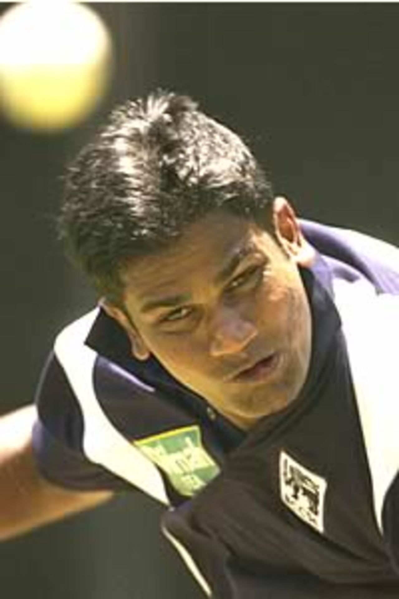 BRISBANE - DECEMBER 16: Nuwan Zoysa bowls in the nets during a Sri Lankan cricket team training session at the Gabba in Brisbane, Australia on December 16, 2002