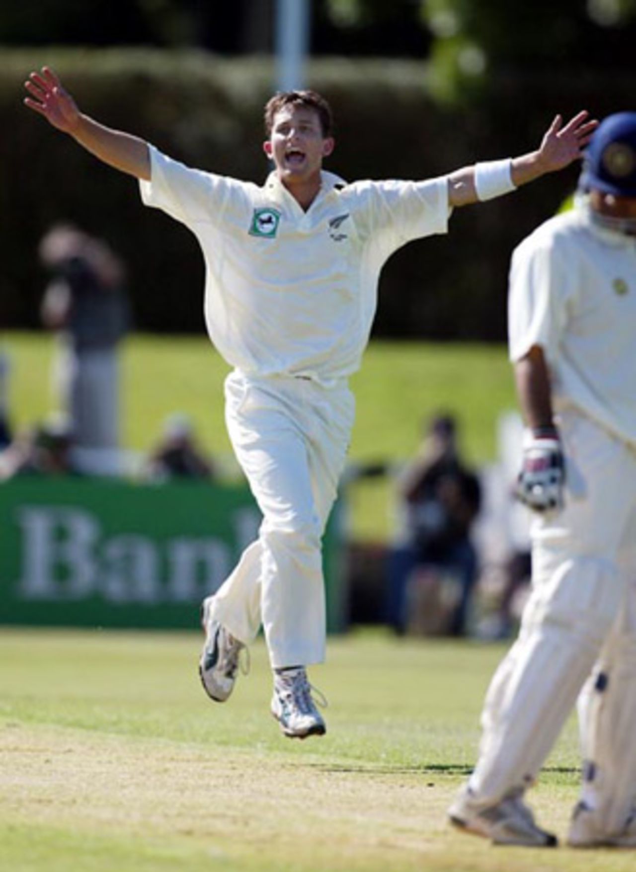 New Zealand bowler Shane Bond celebrates the dismissal of Indian batsman Virender Sehwag, caught by Mark Richardson at short leg for one in his first innings. 2nd Test: New Zealand v India at Westpac Park, Hamilton, 19-23 December 2002 (20 December 2002).