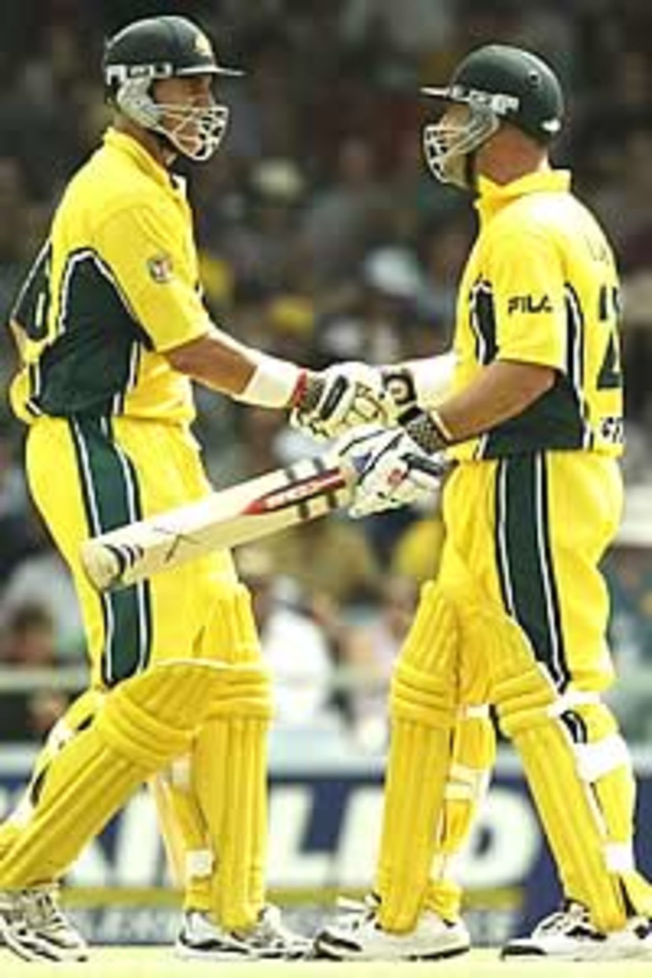PERTH - DECEMBER 22: Matthew Hayden and Darren Lehmann of Australia celebrate their 100 run partnership during the One Day International match between Australia and Sri Lanka at the WACA ground in Perth, Australia on December 22, 2002.