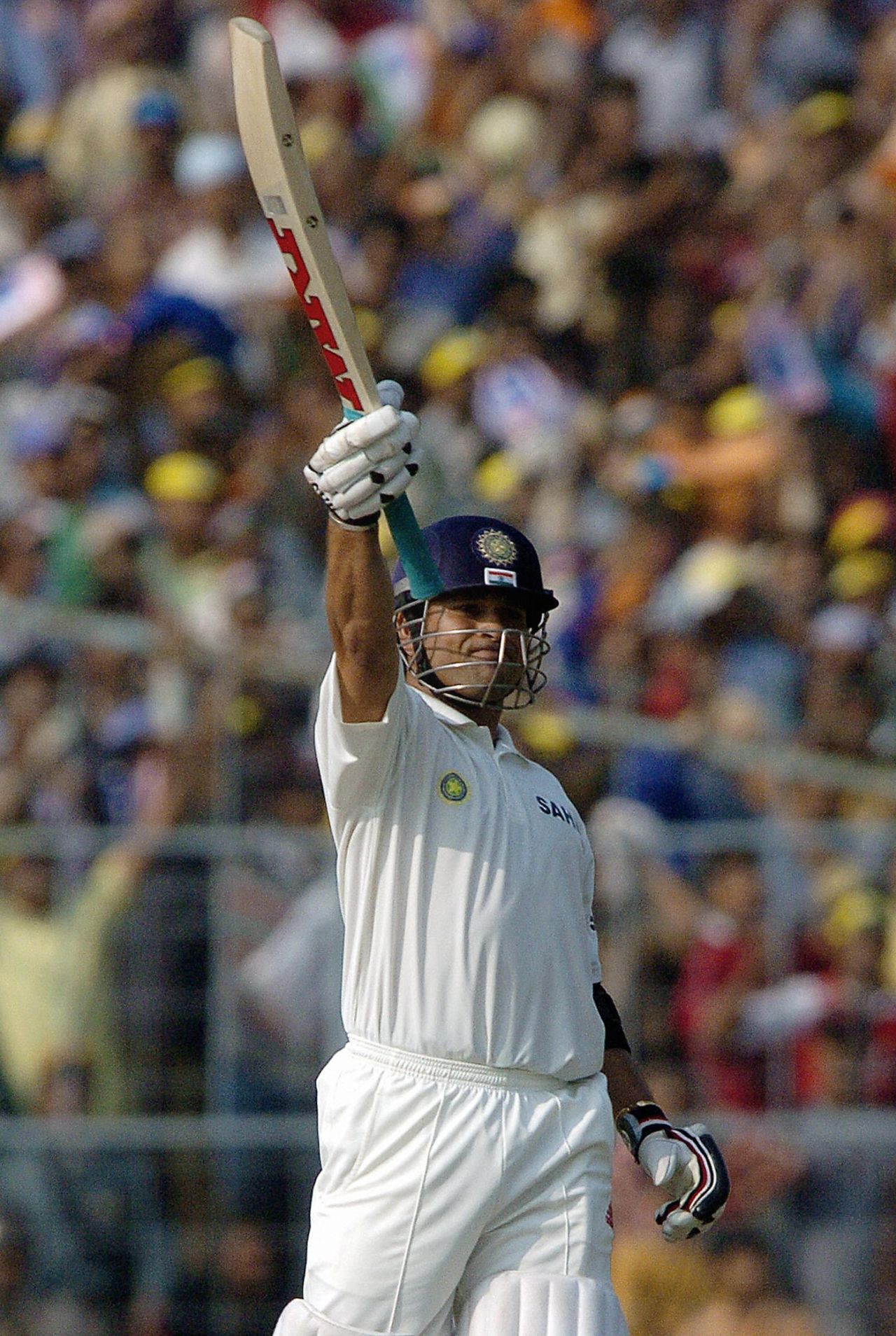 Sachin Tendulkar waves his bat in joy after hitting the winning runs, India v South Africa, fifth day, second Test, Kolkata, December 2 2004