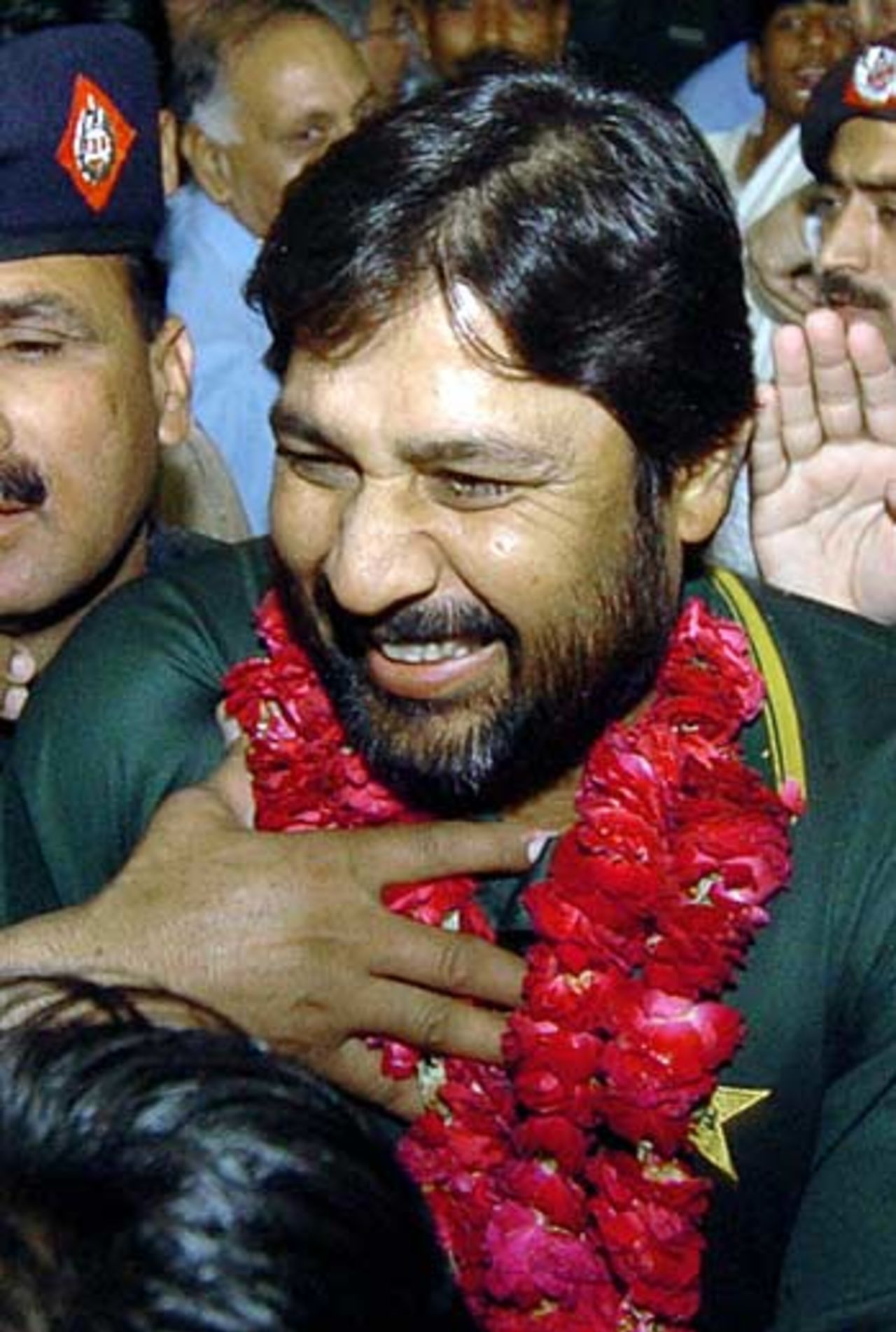 Inzamam-ul-Haq is mobbed on the Pakistan team's return home, Lahore, April 18, 2005