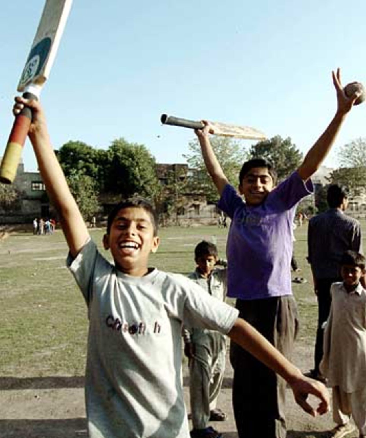 Young fans in Pakistan celebrate victory, April 18, 2005