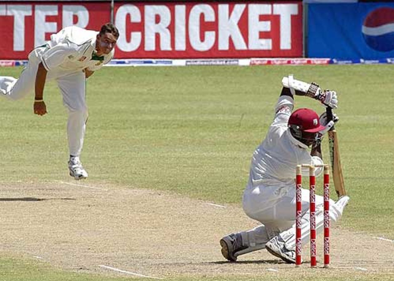 Andre Nel digs one in at Fidel Edwards, West Indies v South Africa, Barbados, April 22, 2005