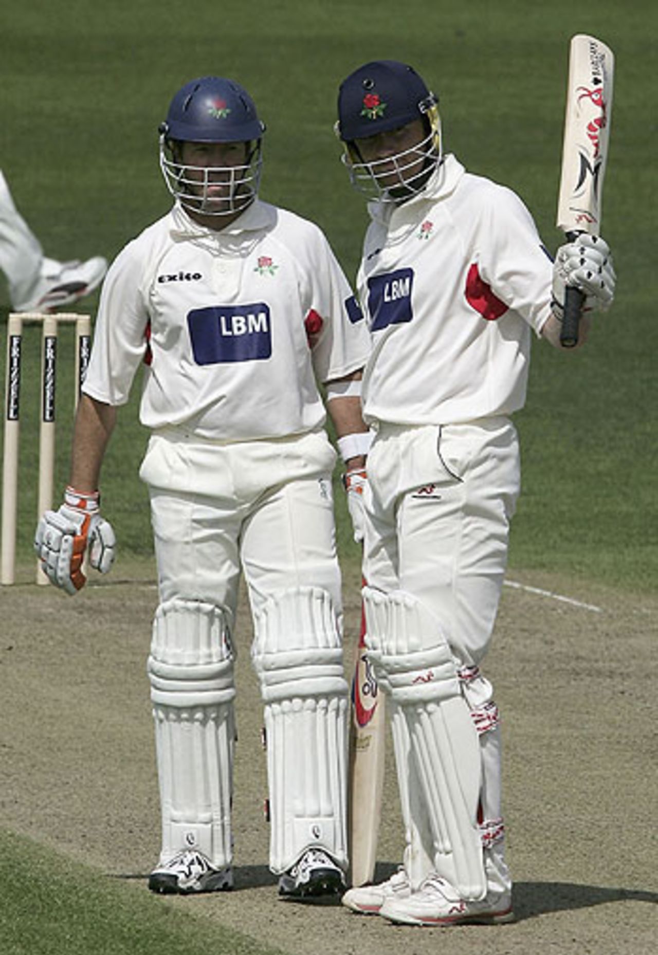Andrew Flintoff celebrates his half-century for Lancashire with Stuart Law, Lancashire v Worcestershire, New Road, April 29, 2005