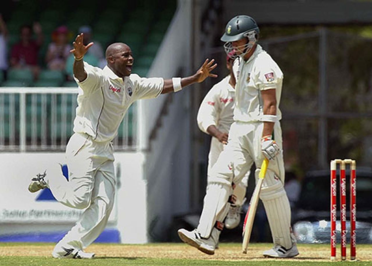 Tino Best celebrates the wicket of AB de Villiers, on the second day in Antigua, West Indies v South Africa, 4th Test, April 30, 2004