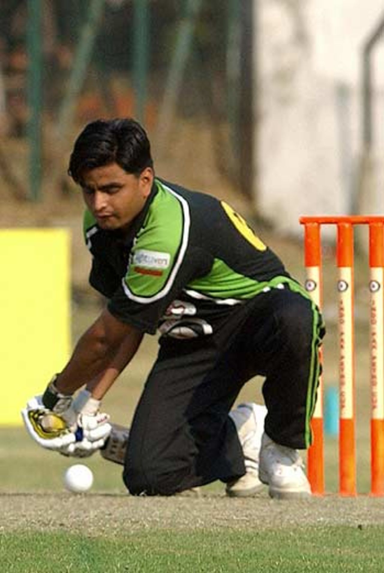 Muhammad Waqas, one of Pakistan's blind cricketers, plays a sweep, India v Pakistan, Fifth game, Delhi, May 5, 2005