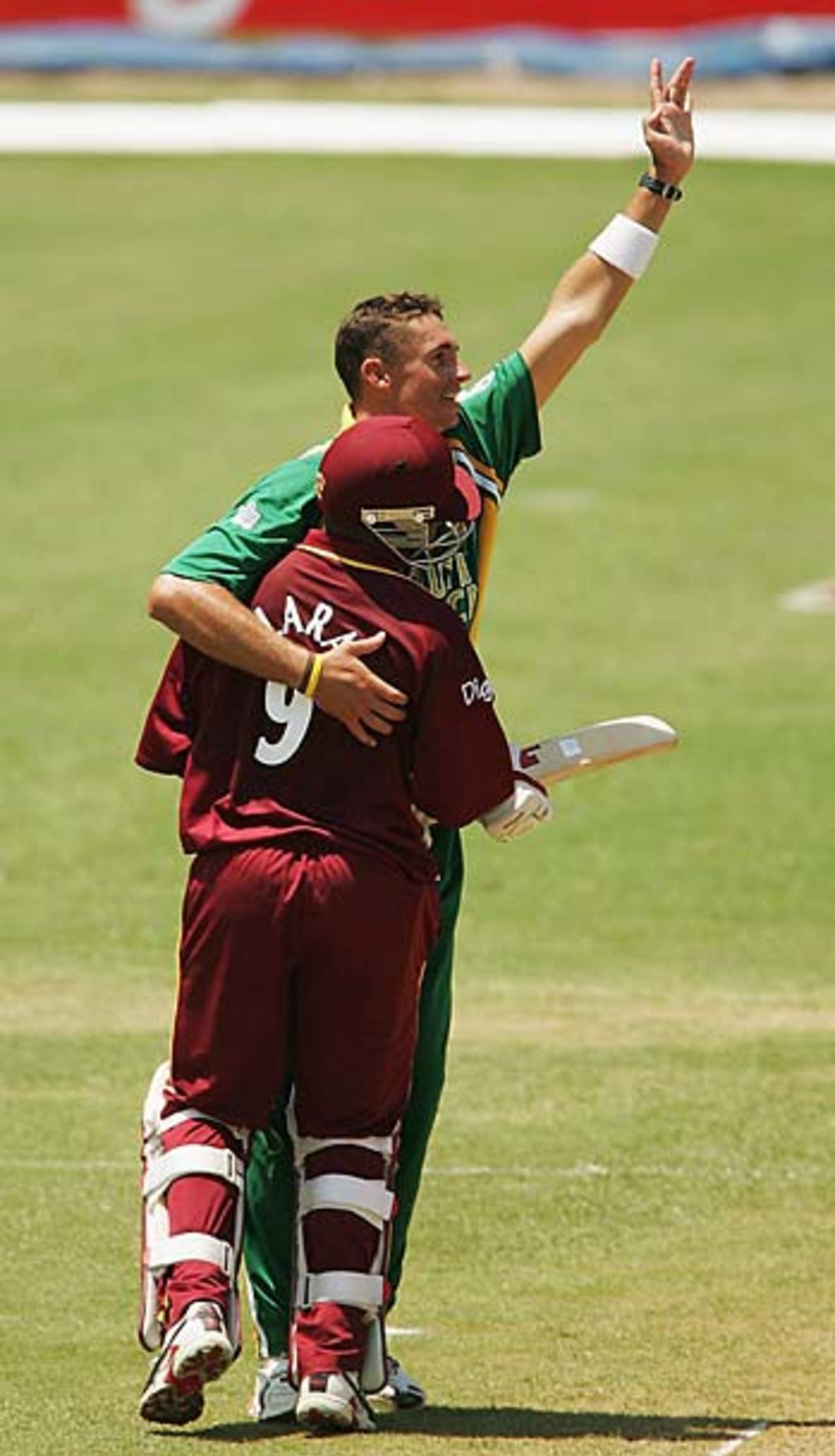 Andre Nel hugs Brian Lara after dismissing him, West Indies v South Africa, 1st ODI, Jamaica, May 7, 2005