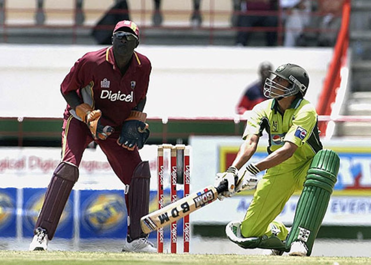Younis Khan attempts a reverse-sweep during the second one-day international between Pakistan and West Indies in St Lucia, May 21, 2005
