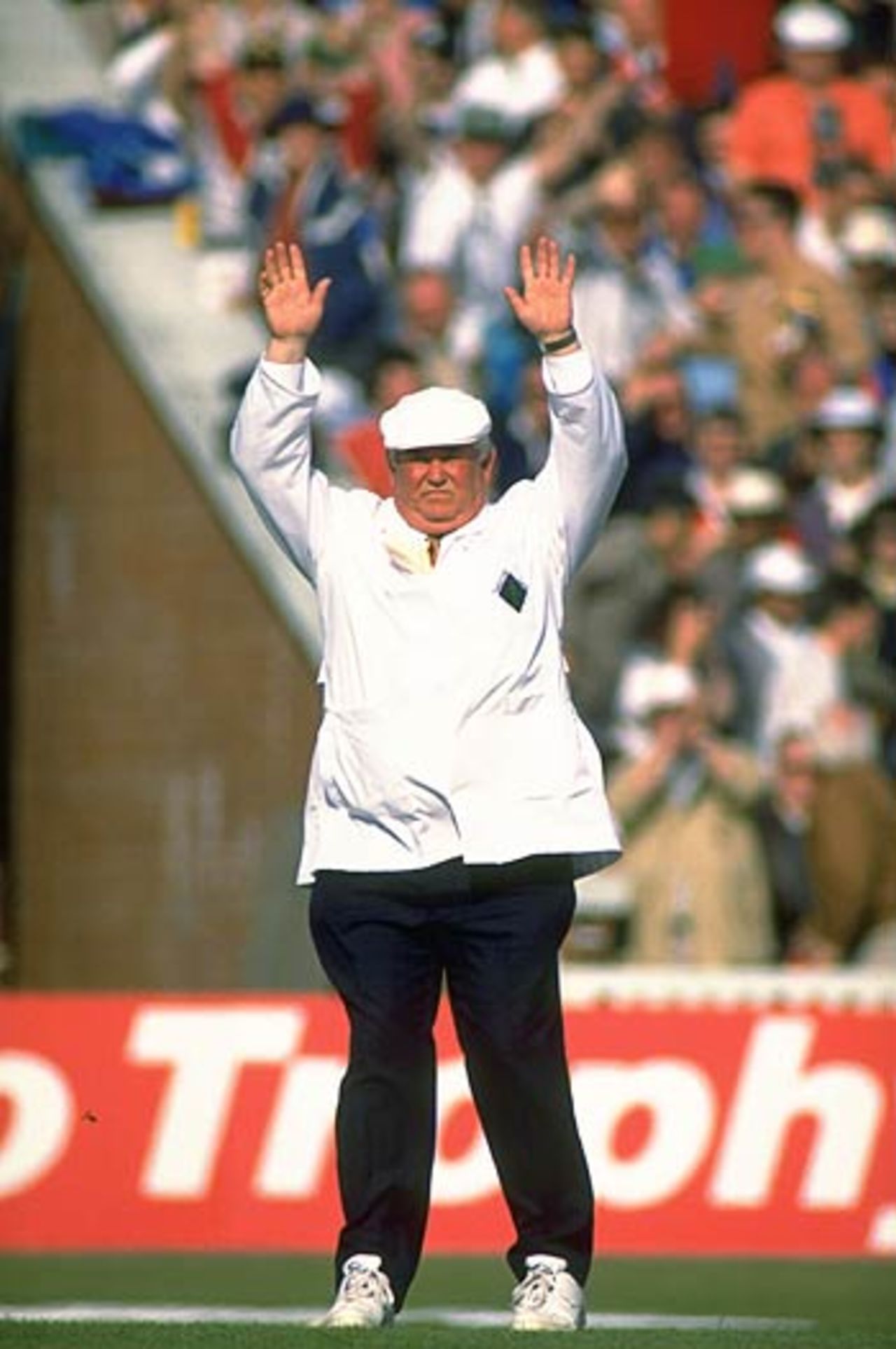 Put your hands in the air - David Shepherd signals a six during a
one-day match between England and Australia at Manchester, May 19, 1993