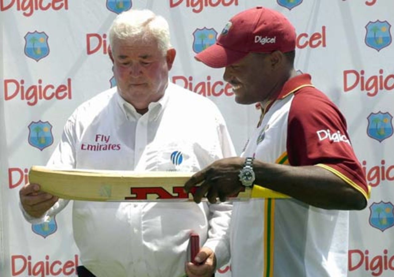 David Shepherd receives a bat from Brian Lara after officiating in his last Test, West Indies v Pakistan, 2nd Test, Kingston, June 7, 2005