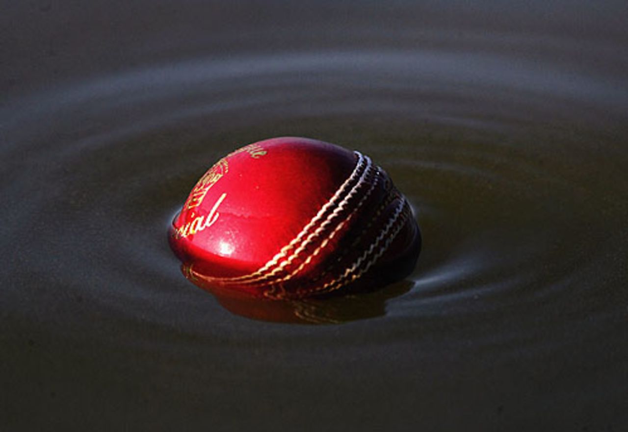 A cricket ball floats in the Thames, as Kevin Pietersen fails to clear the bank. June 9, 2005