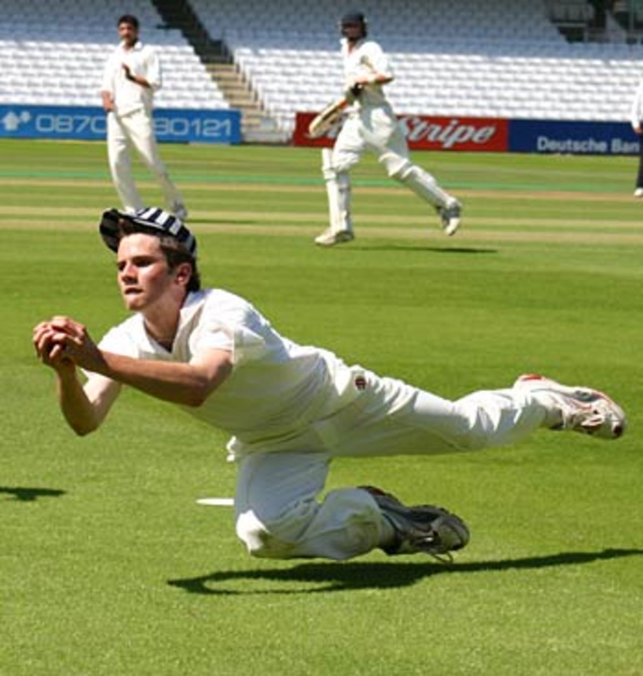 Harper takes a diving catch in front of the Tavern to dismiss Redmayne, Eton v Harrow, June 18, 2005
