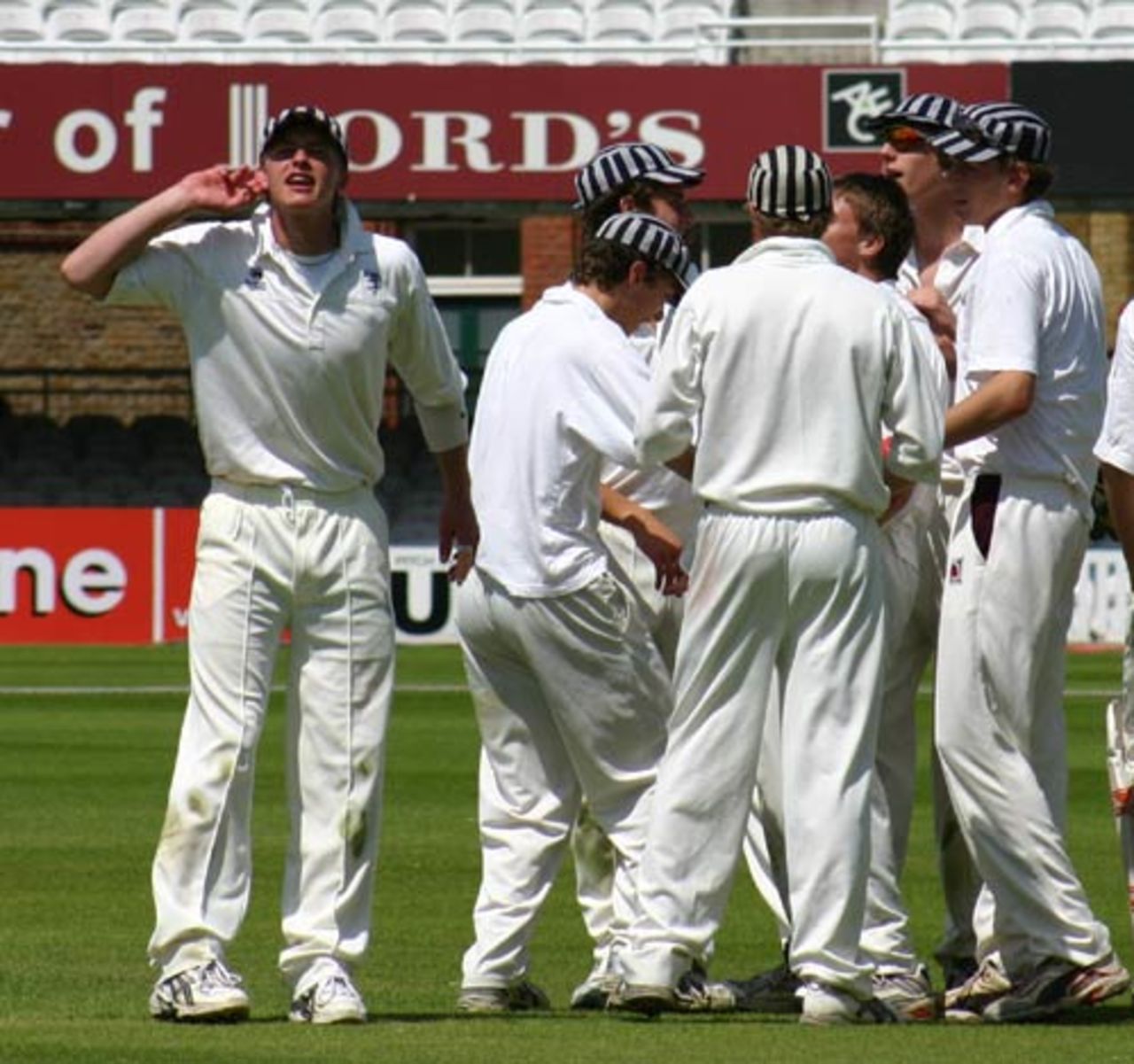 Harrow's fielders celebrate another wicket, Eton v Harrow, June 18, 2005