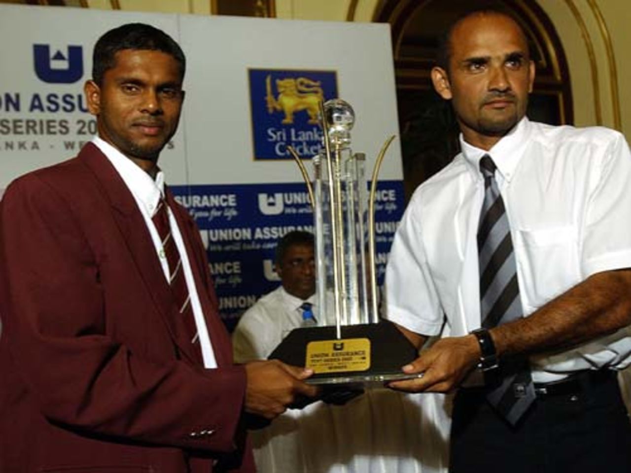 Shivnarine Chanderpaul and Marvan Atapattu pose with a trophy in Colombo July 5 2005, prior to their two match Test series. 
