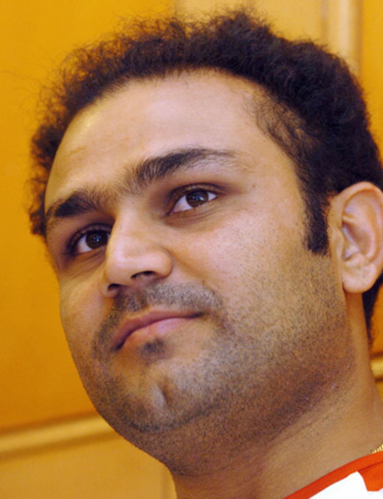 Virender Sehwag pauses during a press conference, July 6, 2005