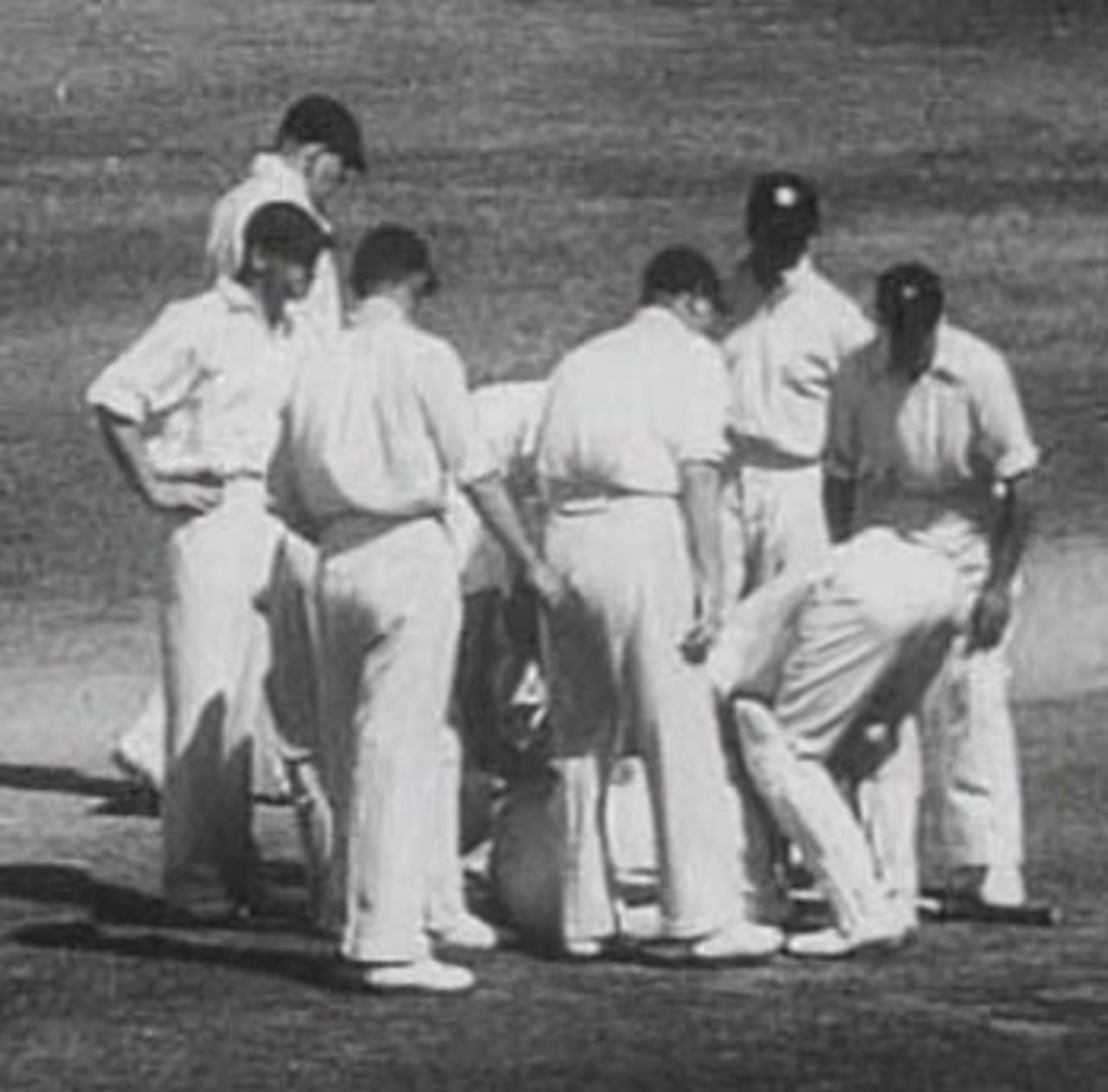 England's fielders crowd round the stricken Bert Oldfield after he was struck by Harold Larwood, Australia v England, 3rd Test, Adelaide, January 16, 1933