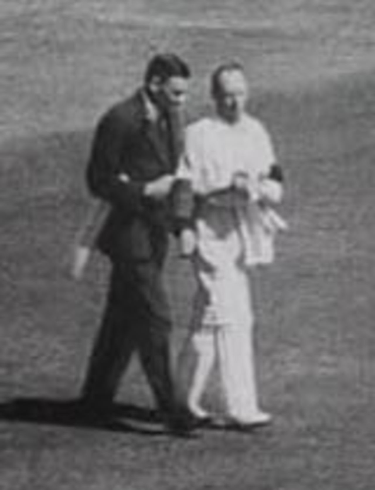 Bill Woodfull escorts Bert Oldfield off the field, Australia v England, 3rd Test, Adelaide, January 16, 1933