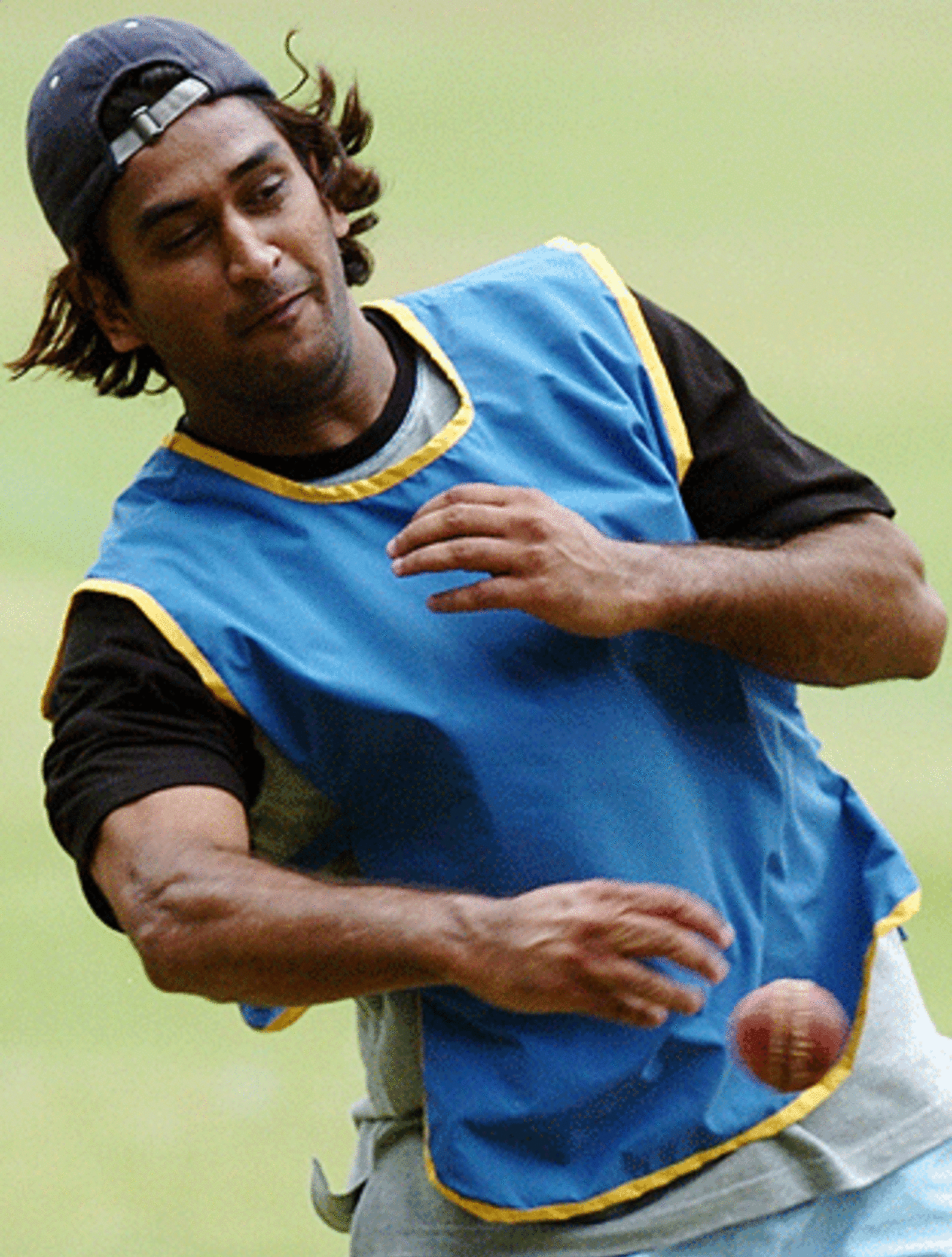 MS Dhoni practices his fielding during a practice session, Bangalore, July 7, 2005