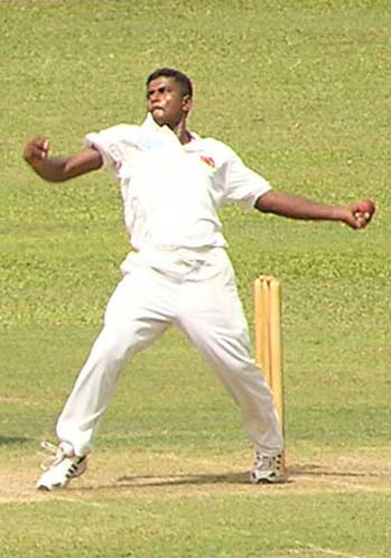 Rangana Herath in action on the first day of Sri Lankans v West Indies, Nondescripts, Colombo, July 9, 2005