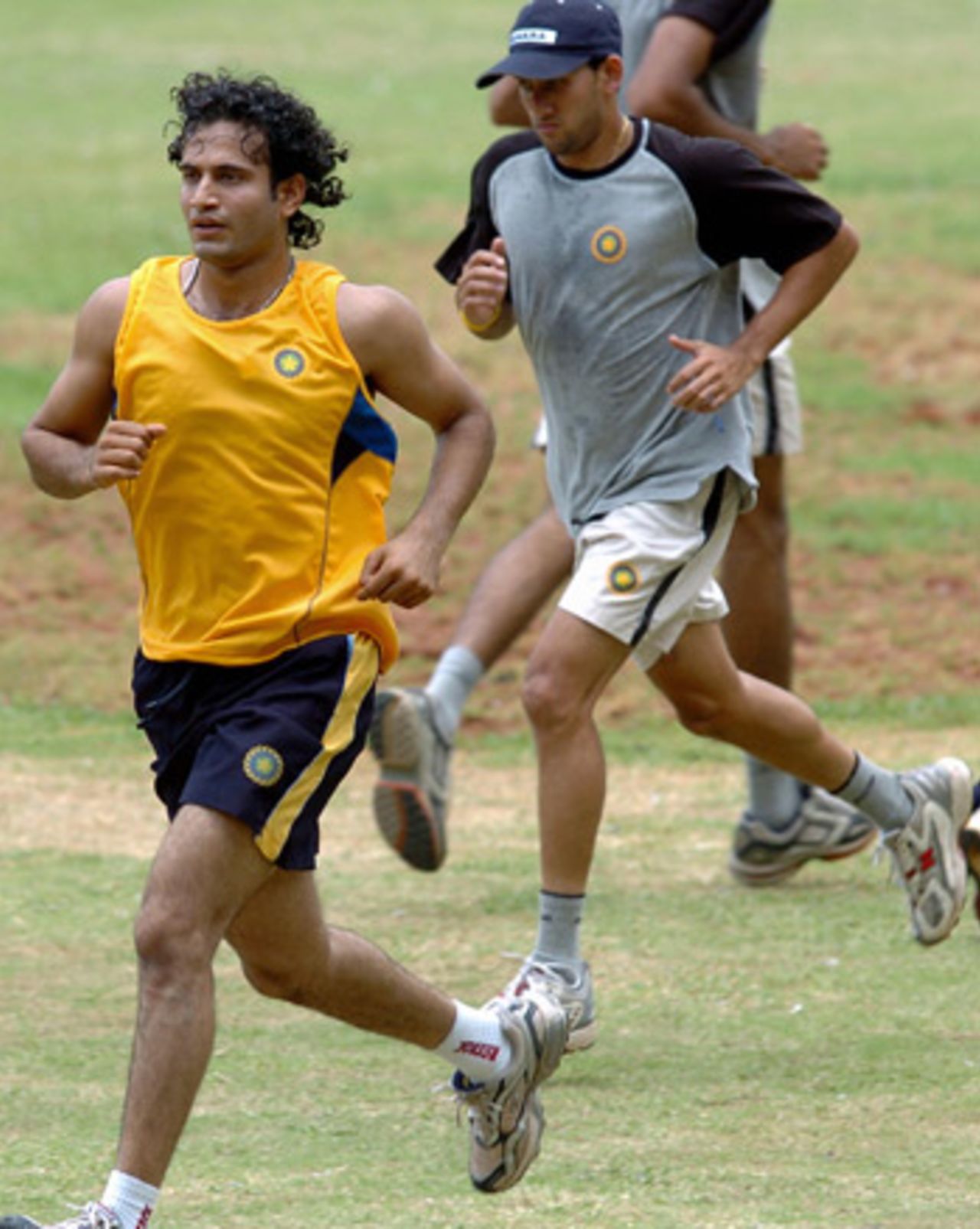 Ajit Agarkar and Irfan Pathan jogging during a practice session, Bangalore, July 11, 2005