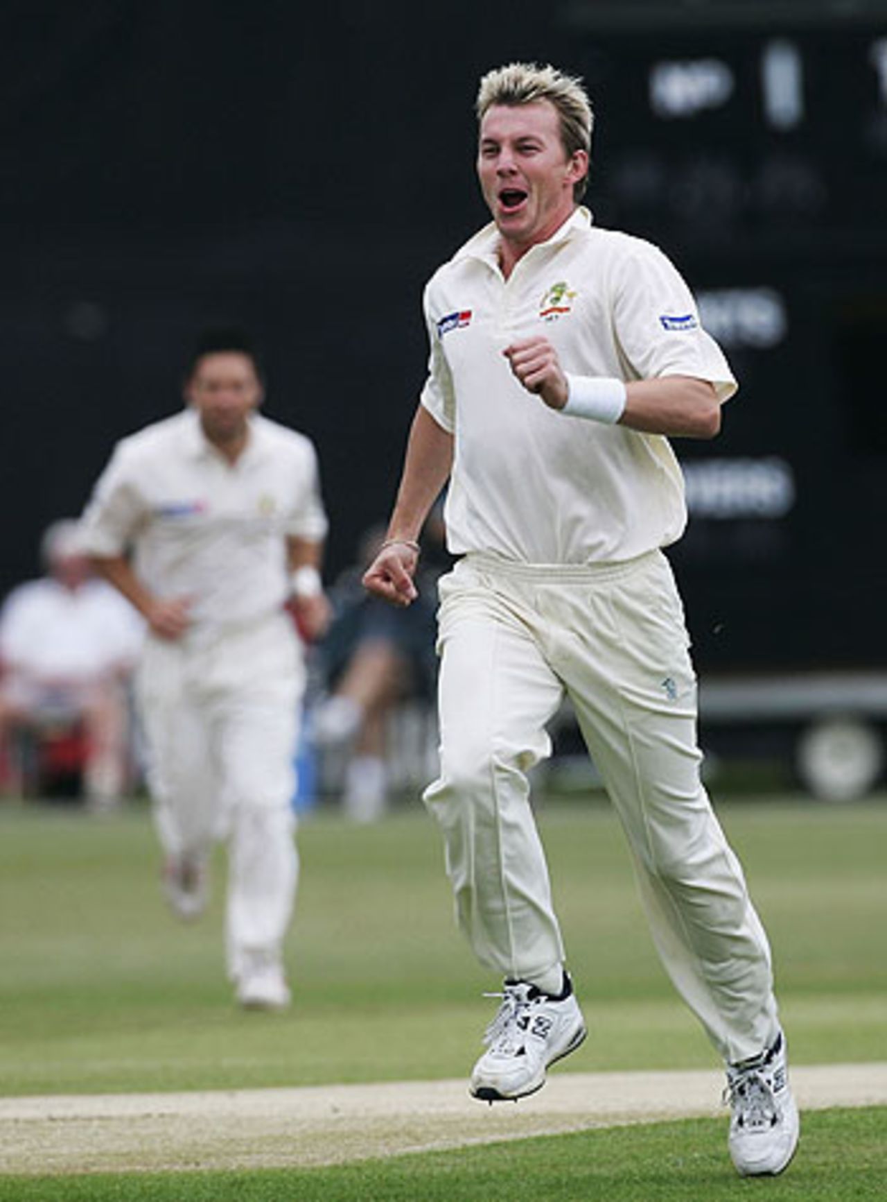 Brett Lee celebrates the first-ball wicket of Darren Robinson, as Australia take on Leicestershire at Grace Road, July 15, 2005