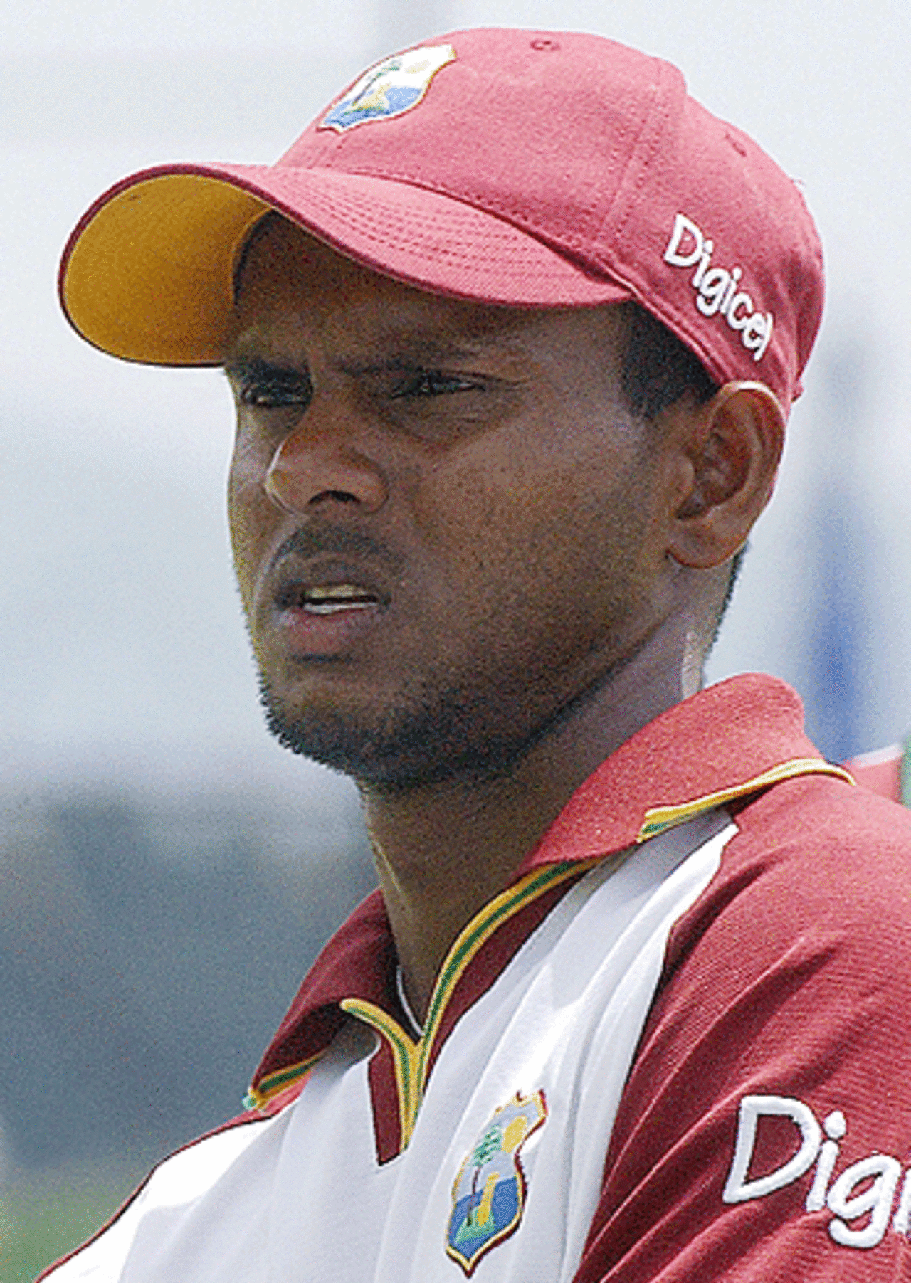 Shivnarine Chanderpaul watches his teammates during a practice session at  Kandy, July 21, 2005