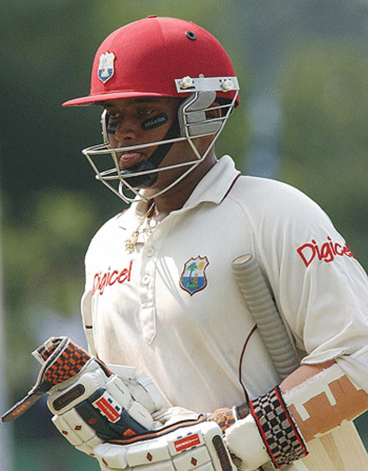 Ryan Ramdass walks back to the pavillion after his dismissal by Sri Lankan bowler Chaminda Vass during the first day of the final Test match between Sri Lanka and West Indies at Asgiriya ground in Kandy, 23 July 2005