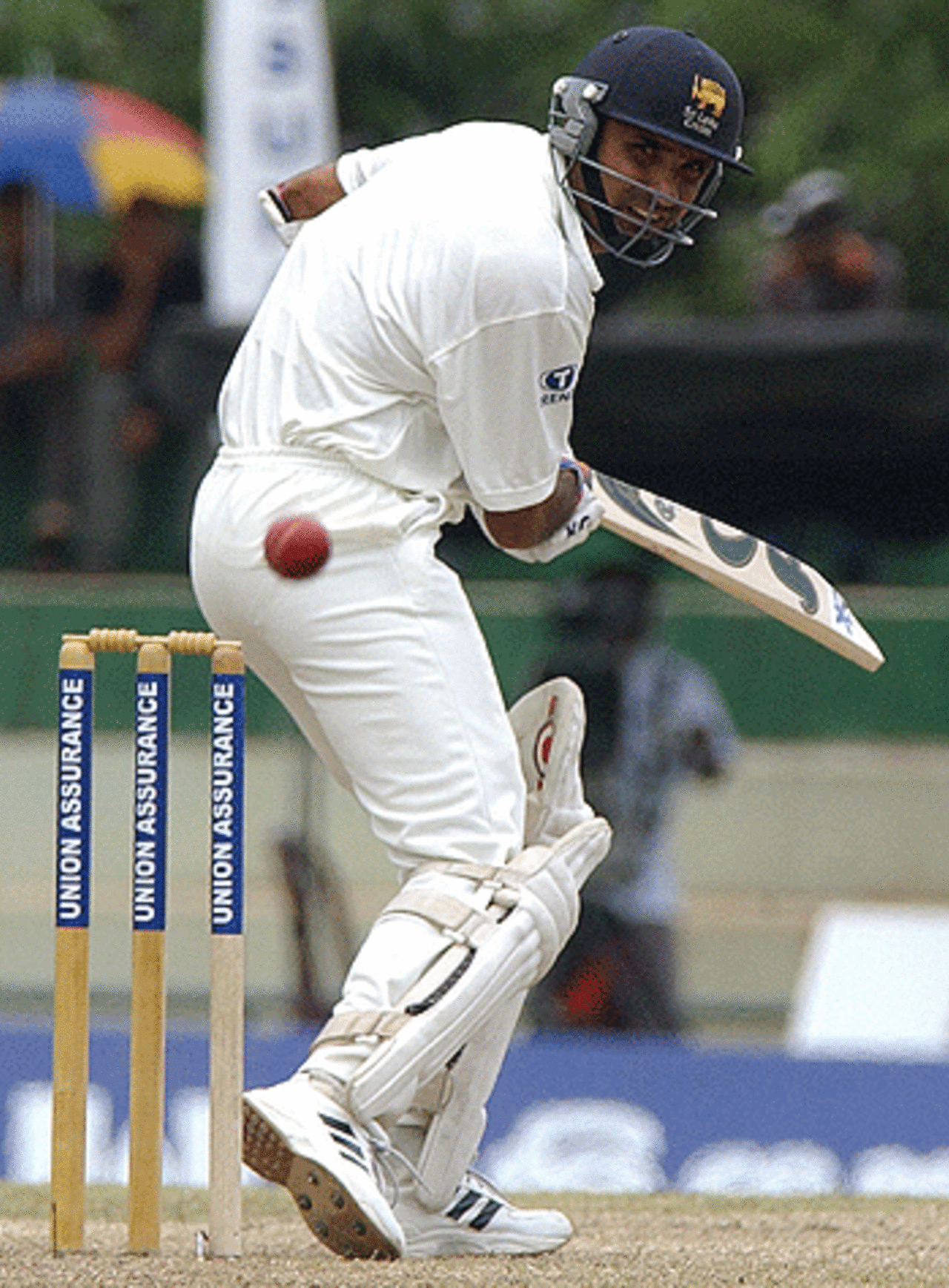 Sri Lankan cricket captain, Marvan Atapattu follows the ball as he defends the wicket, during the second day of the second and final test match between Sri Lanka and West Indies, at Asgiriya cricket grounds in Kandy, 23 July 2005
