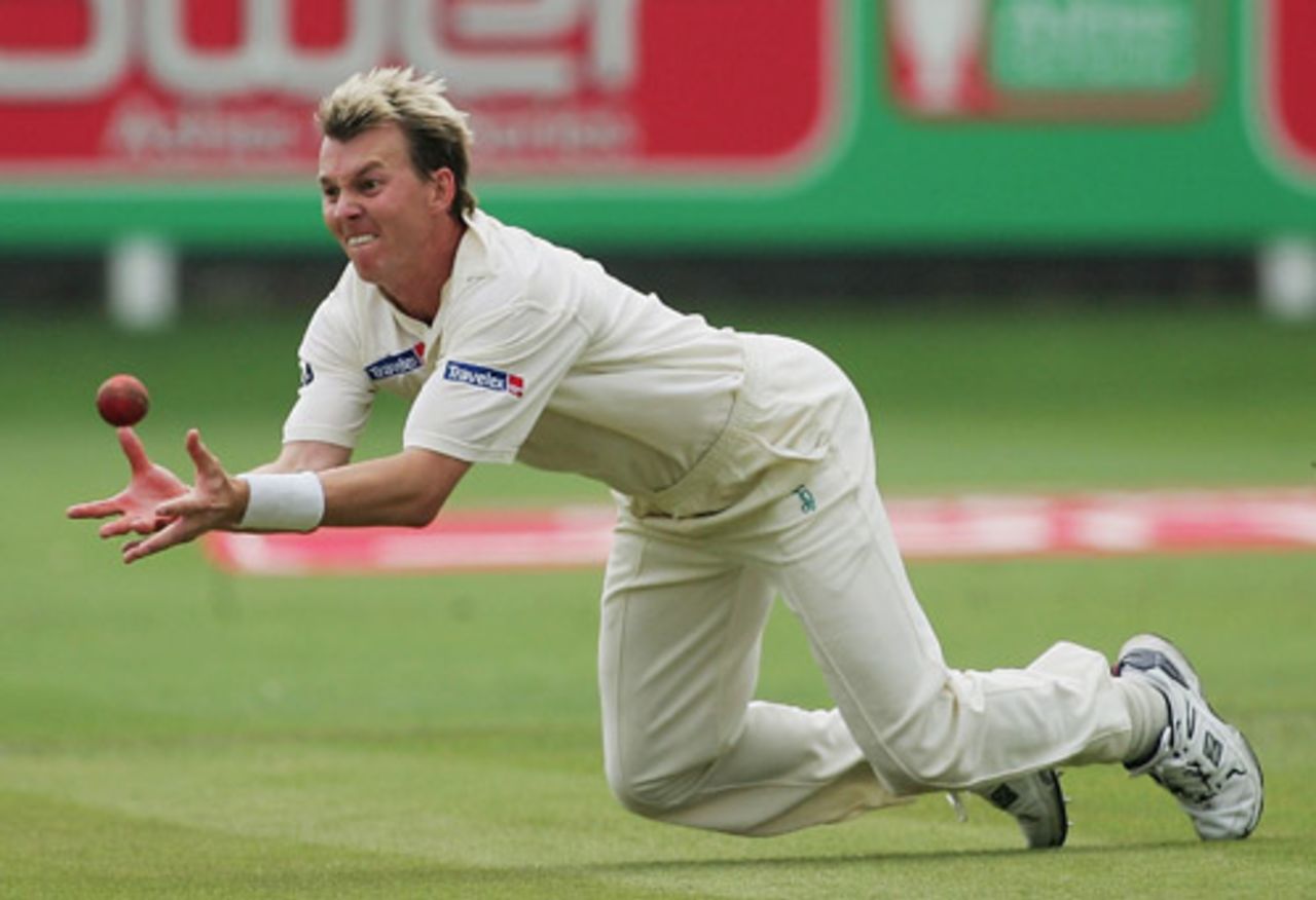 Brett Lee dives to take a brilliant catch off his own bowling, to dismiss Andrew Strauss, England v Australia, Lord's, July 23, 2005