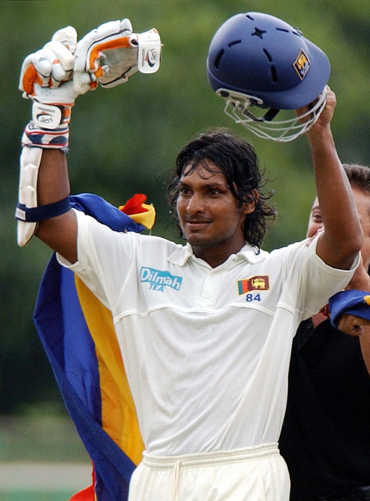 Kumar Sangakkara acknowledges the crowd after completing 100 runs during the third day's play of the second and final Test match between Sri Lanka and the West Indies at the Asgiriya cricket grounds in Kandy, 24 July 2005