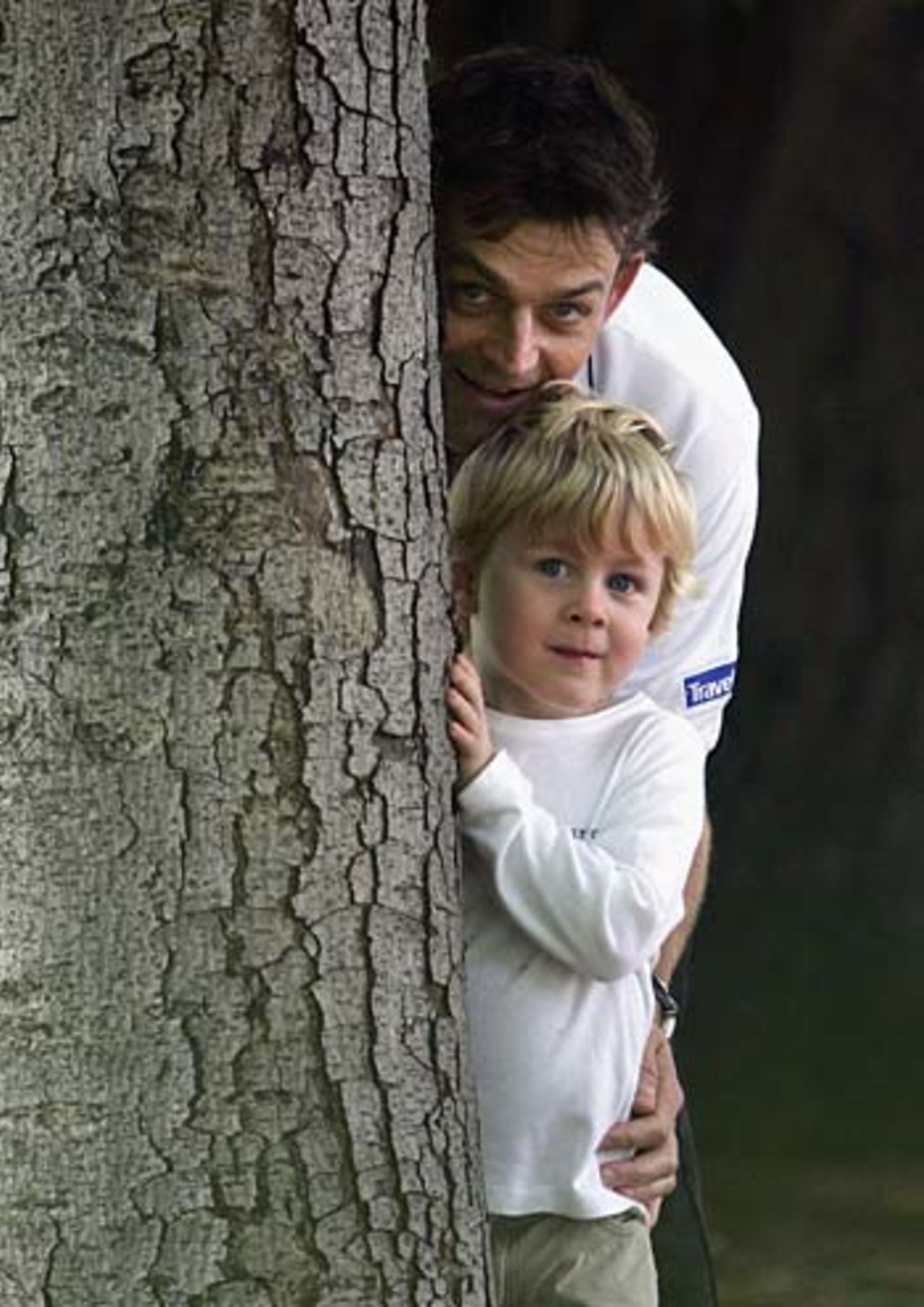 Adam Gilchrist and his son Harry in Kensington Gardens, July 26, 2005