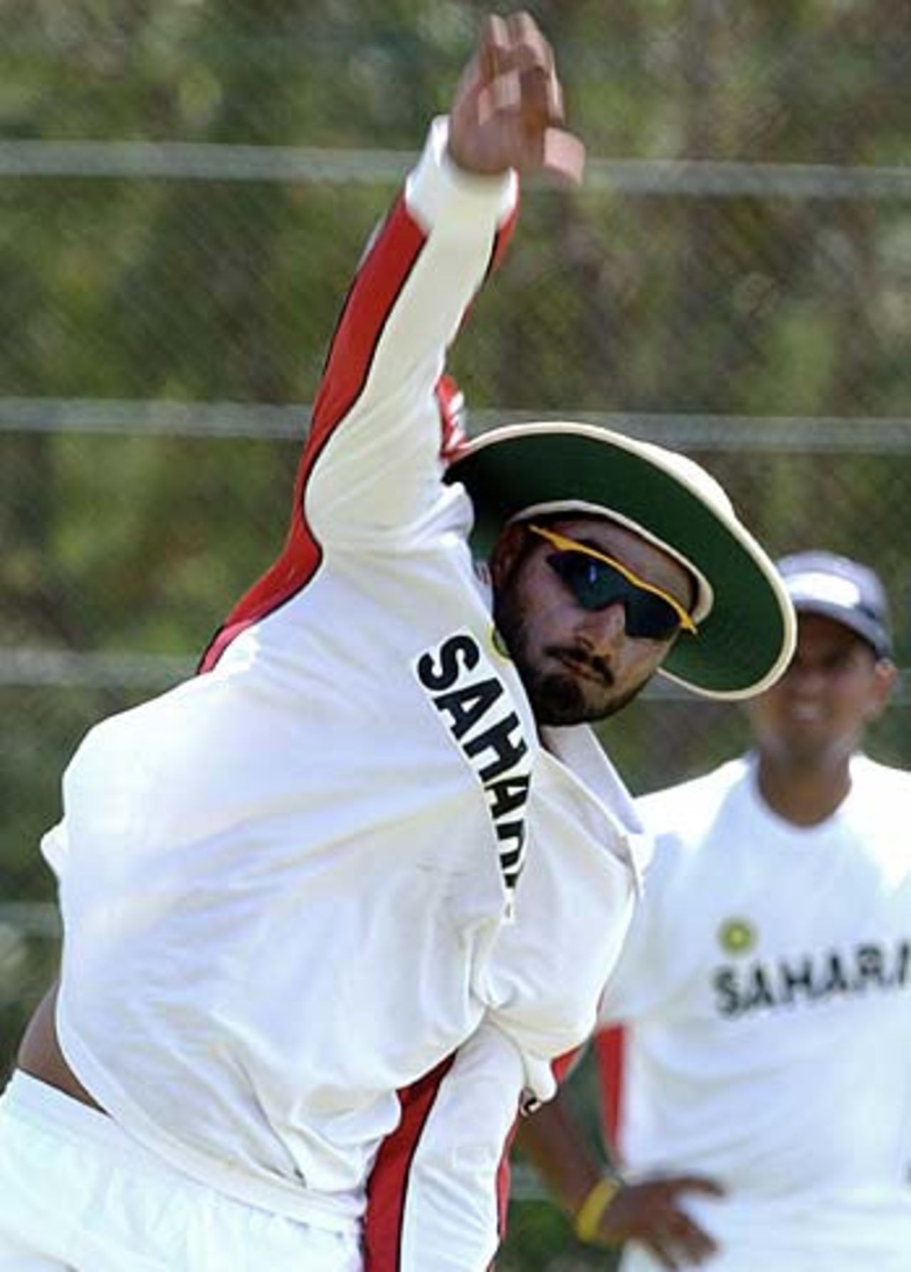 Harbhajan Singh unwinds during a practice session in Dambulla, July 28, 2005