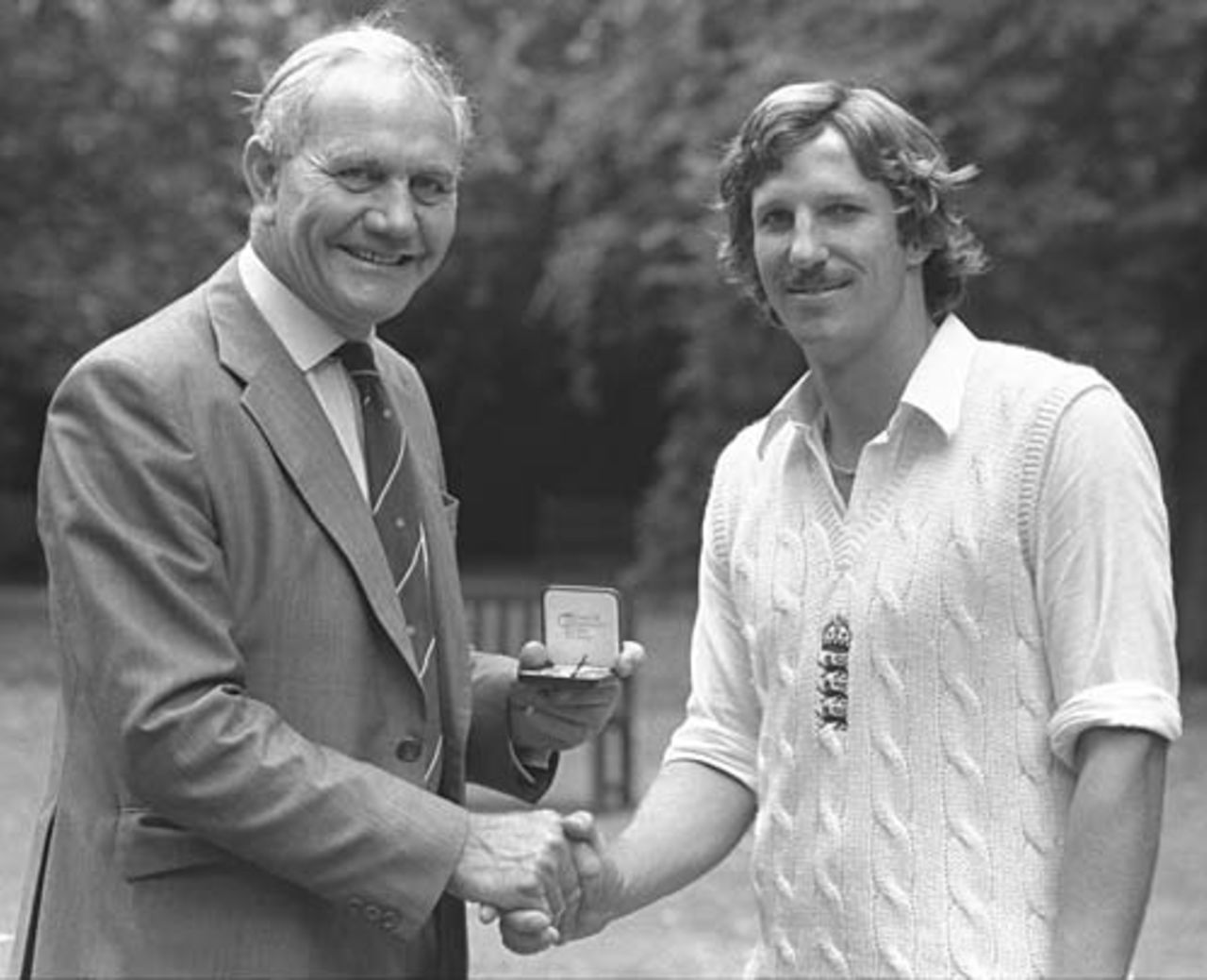 Alec Bedser presents Ian Botham with a special Cornhill Medal for taking the fastest ever 100 Test wickets, England v India, Lord's, August 1979 
