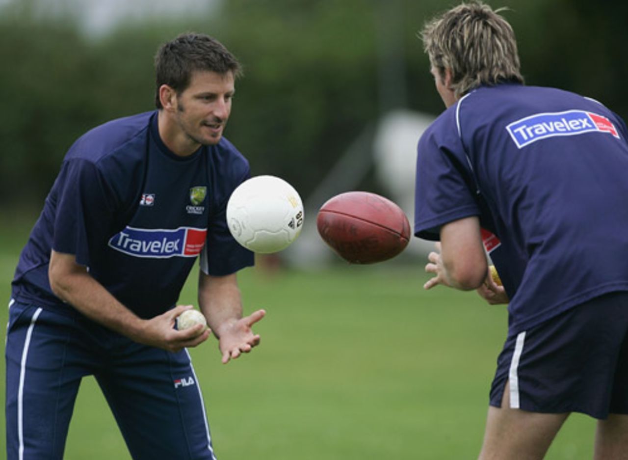 Michael Kasprowicz and Glenn McGrath during training