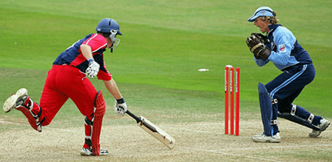 Dominic Cork is run out by Jon Batty in the Twenty20 Cup semi-final between Lancashire and Surrey at The Oval, July 30, 2005