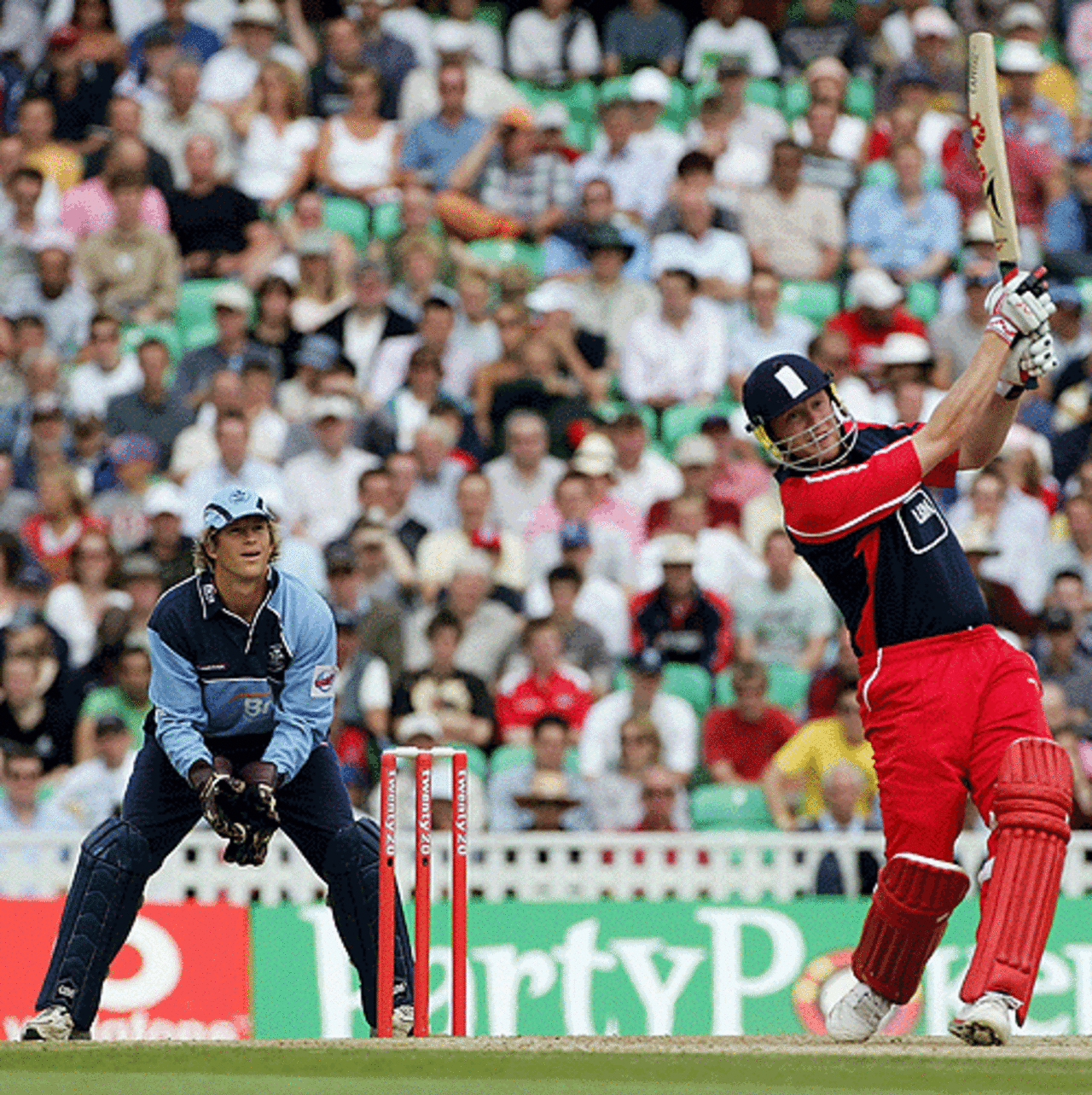 Andrew Flintoff smashes a six for Lancashire in the Twenty20 semi-final against Surrey at The Oval, July 30, 2005