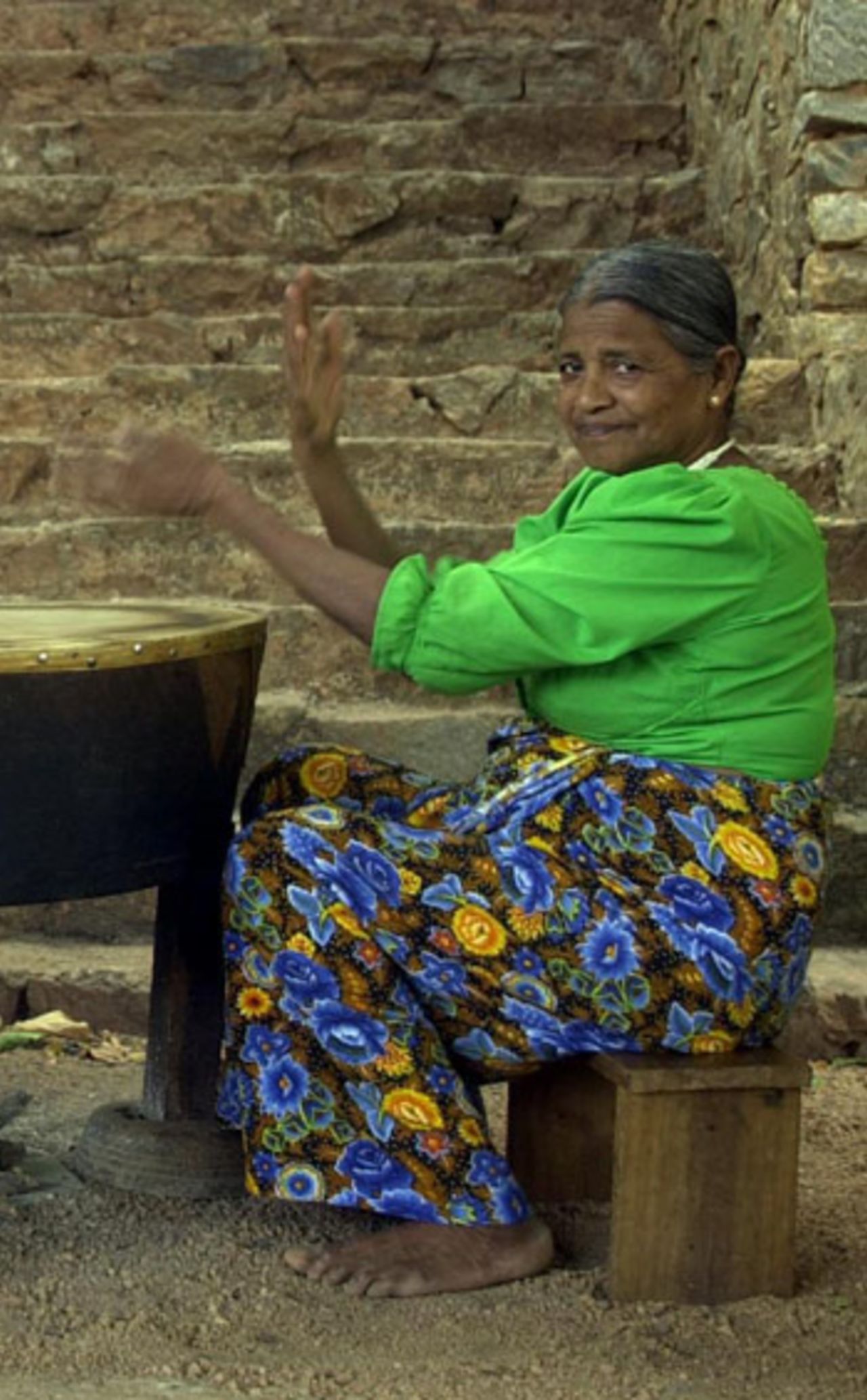 A Sri Lankan woman drumming, Sri Lanka, July 29, 2005