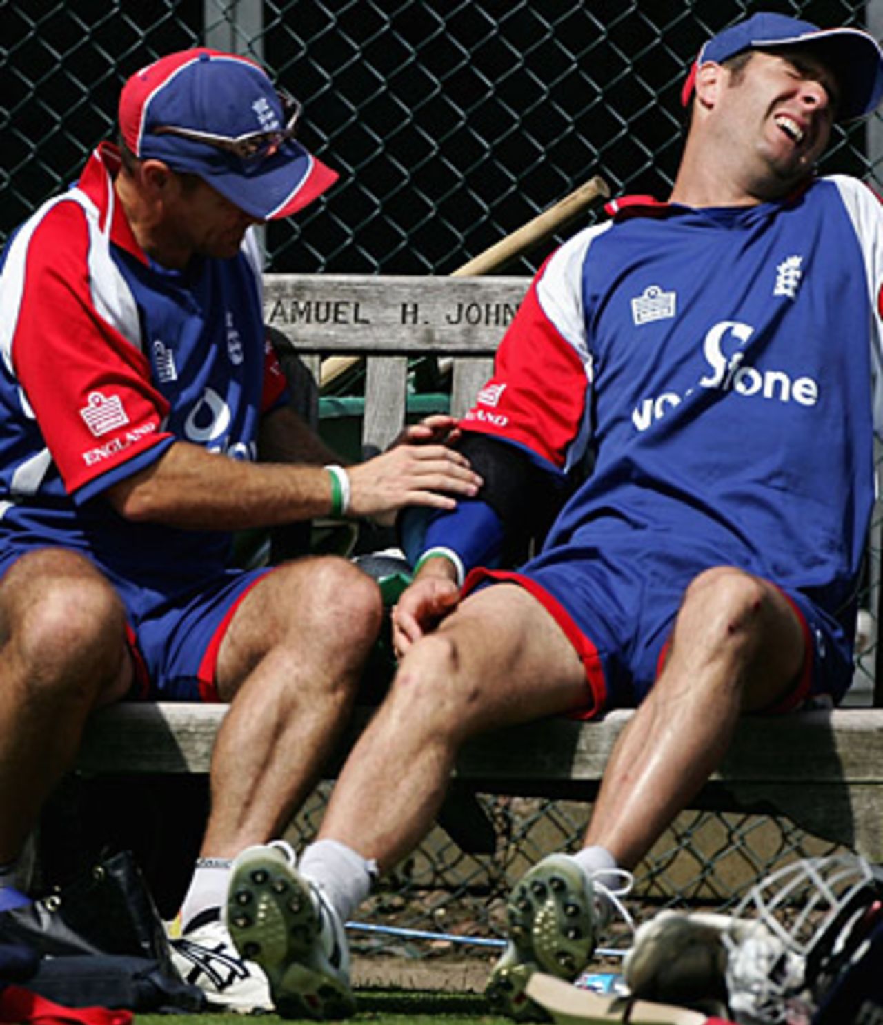 Michael Vaughan winces in pain, having been struck on the arm by Chris Tremlett in a net session, Birmingham, August 2, 2005