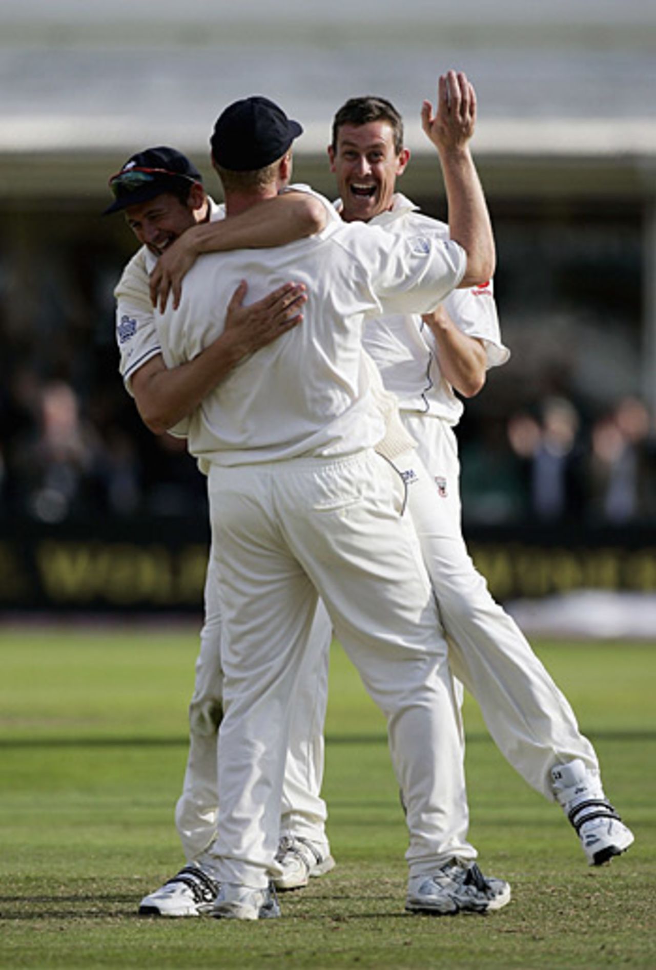 An ecstatic Ashley Giles celebrates the dismissal of Adam Gilchrist, with Steve Harmison (L) and Andrew Flintoff, England v Australia, Edgbaston, August 6, 2005
