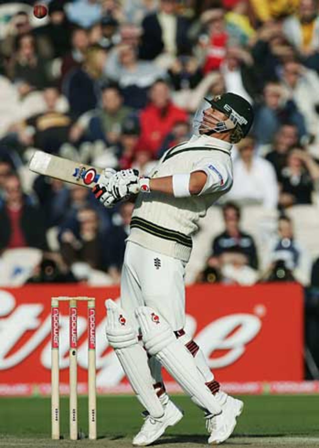 Shane Warne sways away from a bouncer during a quick spell of bowling from Andrew Flintoff, England v Australia, 3rd Test, Old Trafford, August 13
