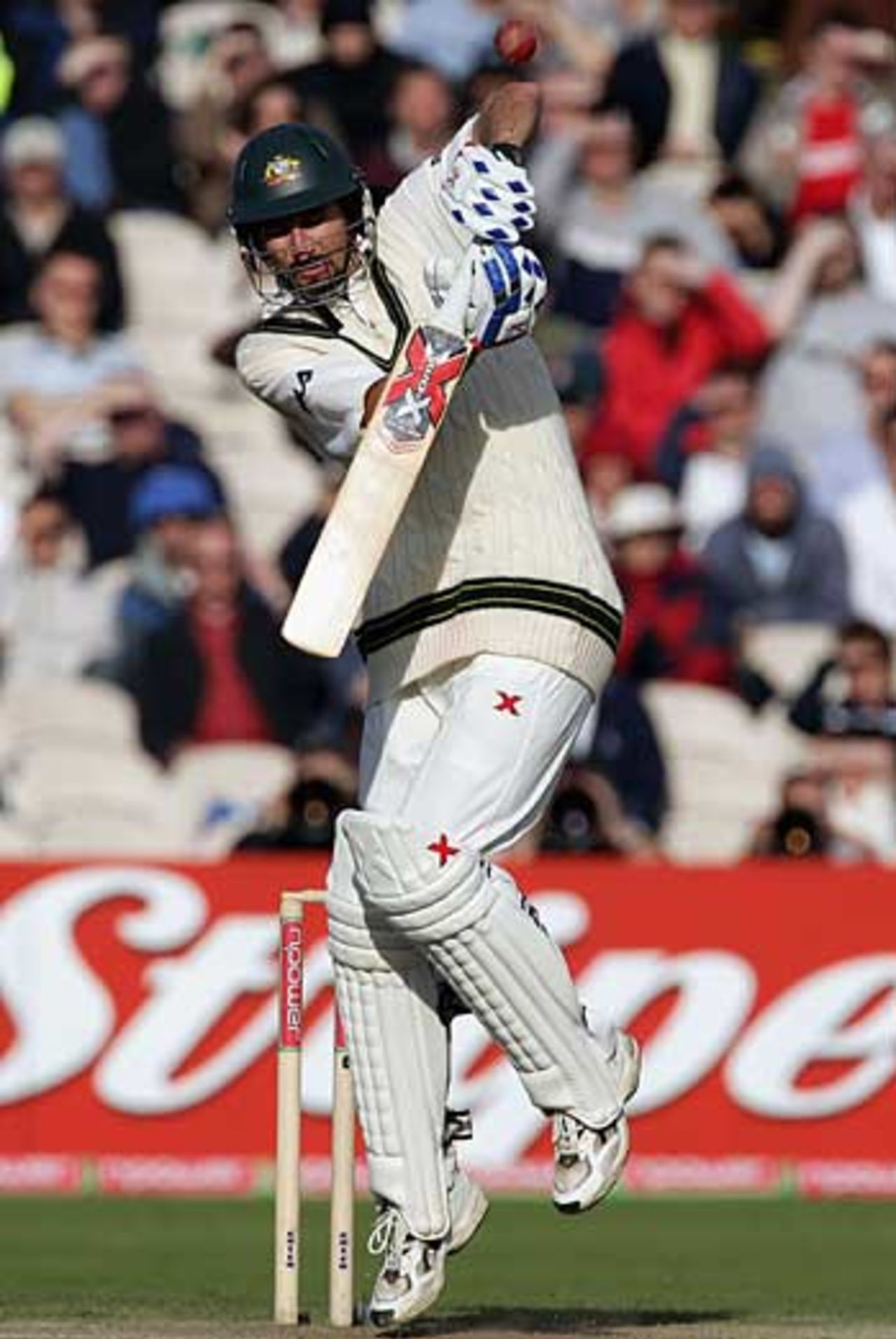 Jason Gillespie takes a blow during his valuable, unbeaten innings of 7, England v Australia, 3rd Test, Old Trafford, August 13