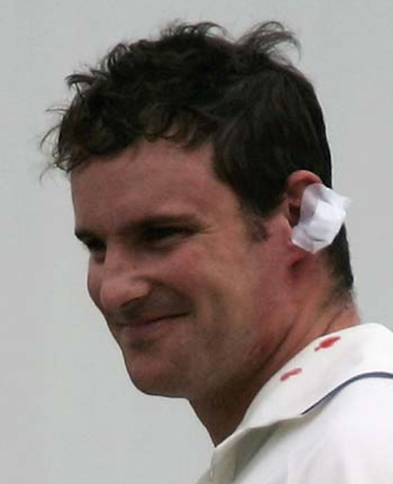 Andrew Strauss keeps smiling despite being struck by Brett Lee, England v Australia, 3rd Test, Old Trafford, August 14, 2005