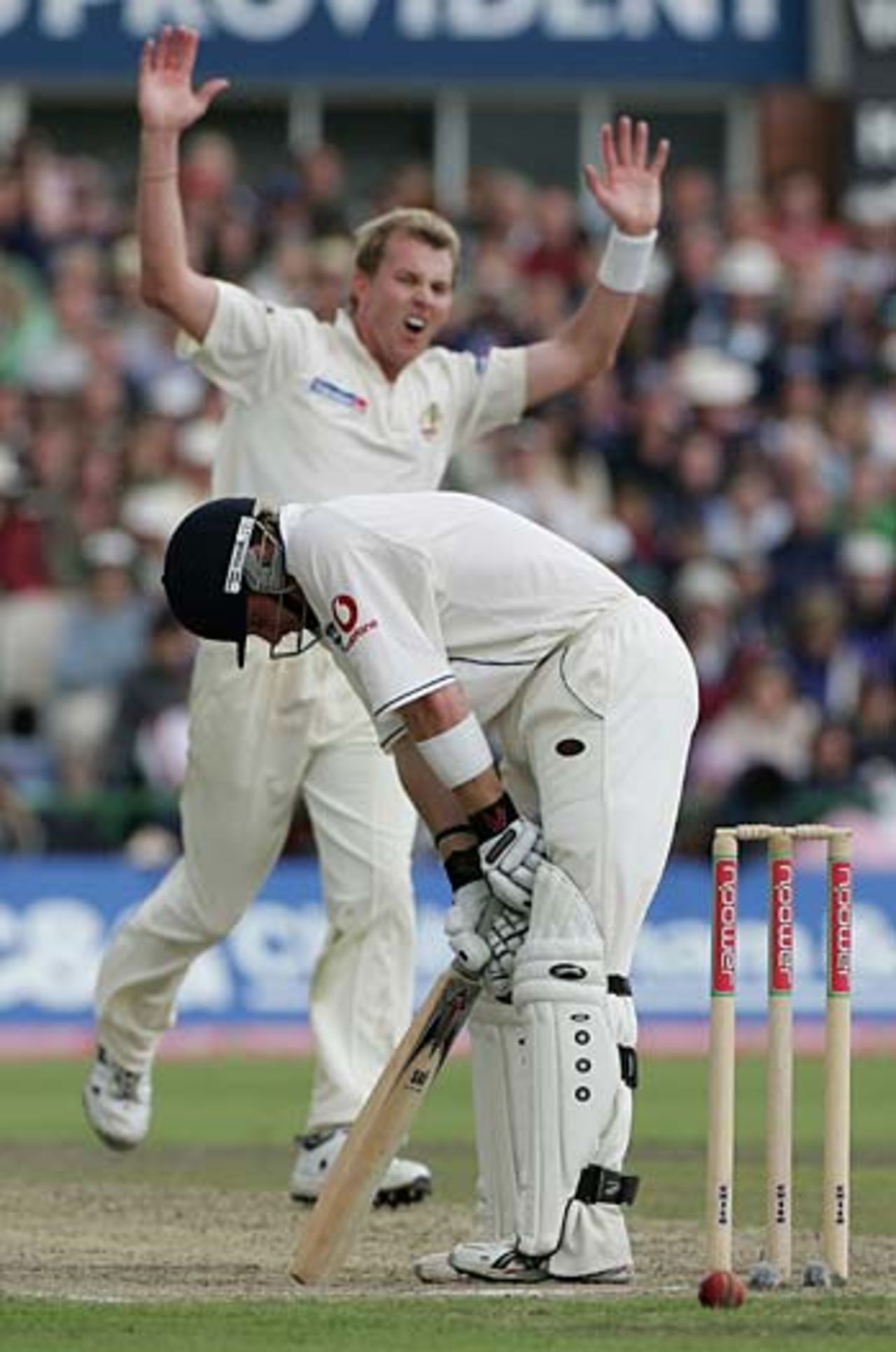 Frustration for Brett Lee but a reprieve for Ian Bell as the ball hits his stumps without dislodging a bail, England v Australia, 3rd Test, Old Trafford, August 14, 2005