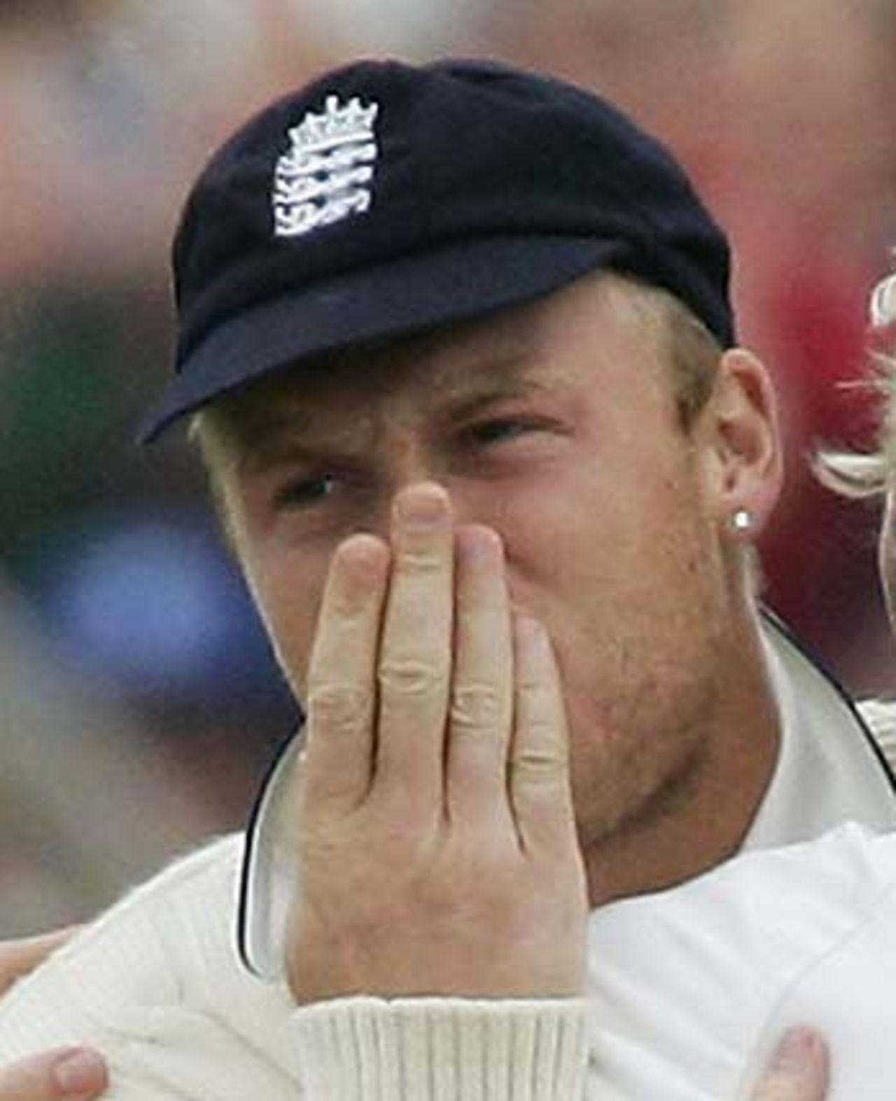 Andrew Flintoff takes a blow to the nose after some overenthusiastic high fives, England v Australia, 3rd Test, Old Trafford, August 15, 2005