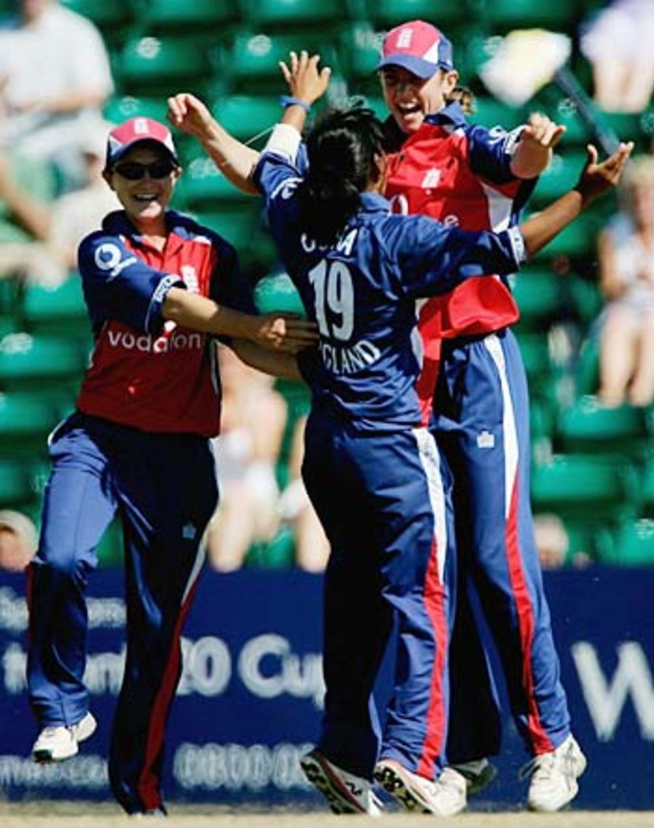 Isa Guha runs  to congratulate team-mate Beth Morgan on catching out Belinda Clarke, England v Australa, Cheltenham, 1st ODI, August 15, 2005