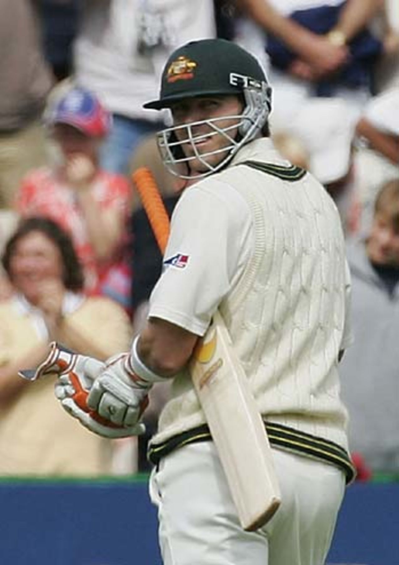 A rueful look back from Damien Martyn after his innings had been cut short by Steve Bucknor's poor lbew decision, England v Australia, 3rd Test, Old Trafford, August 15, 2005