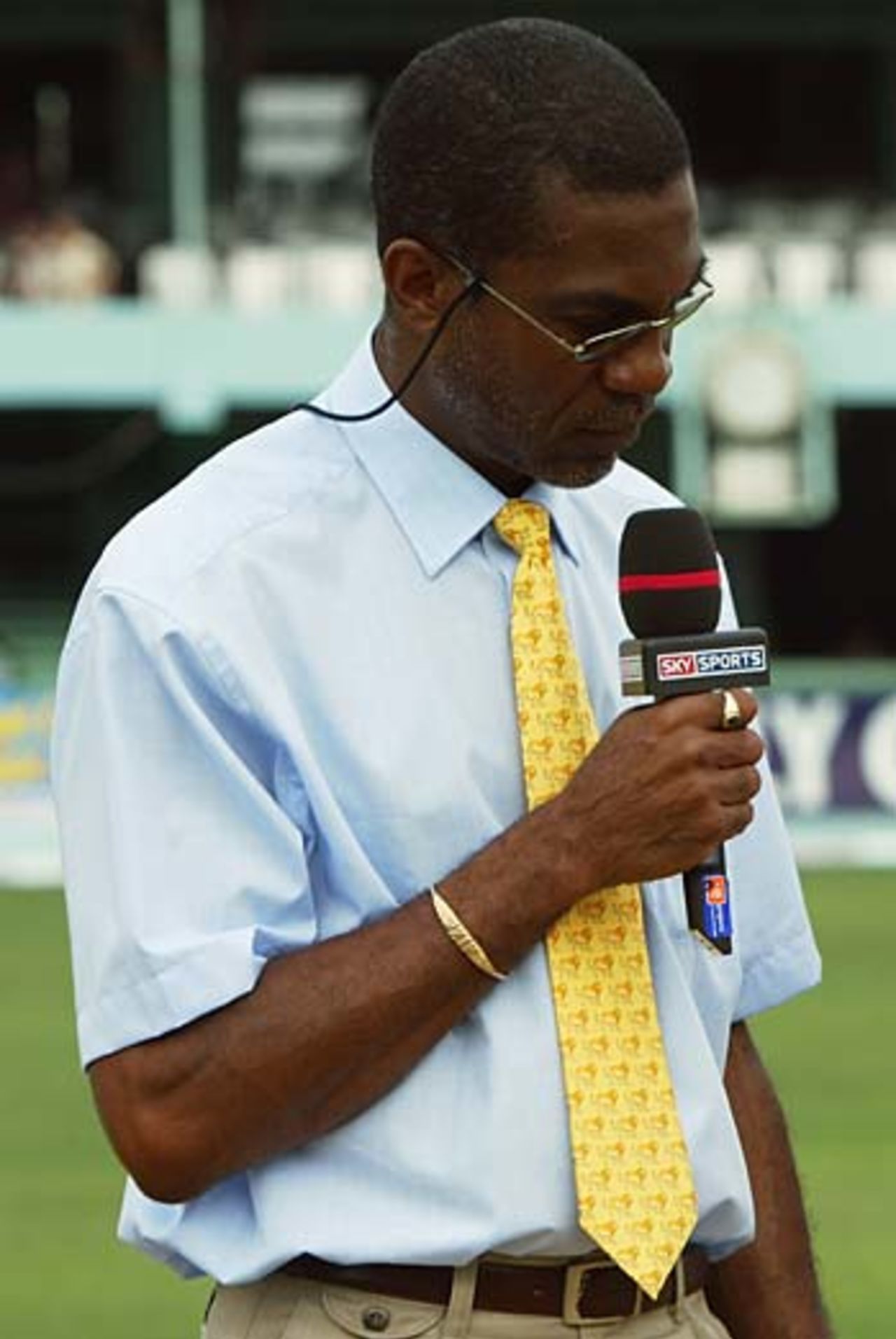 MIchael Holding in pre-match pitch inspection mode