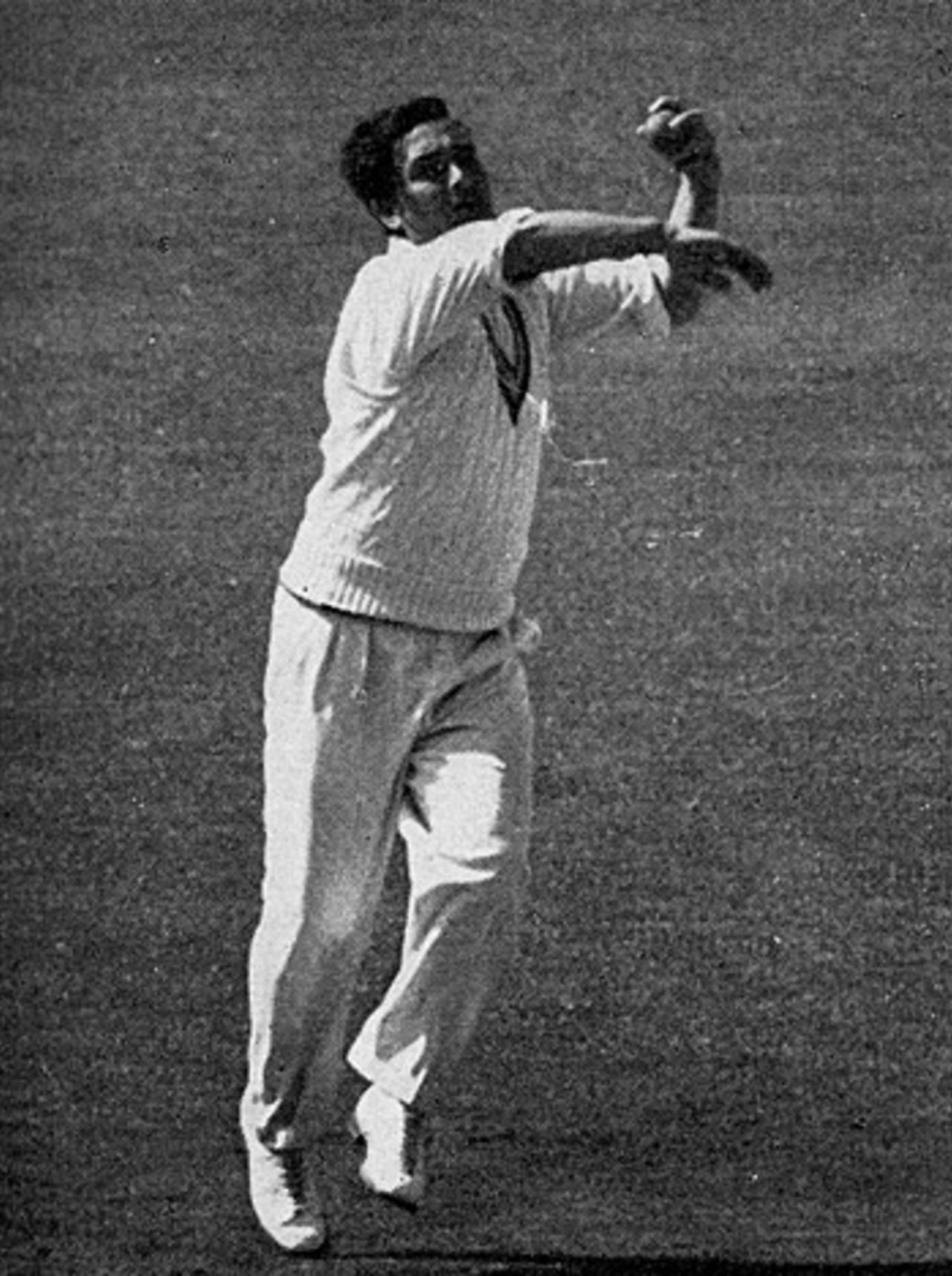 Denis Compton winds up to bowl his chinamen, 1954
