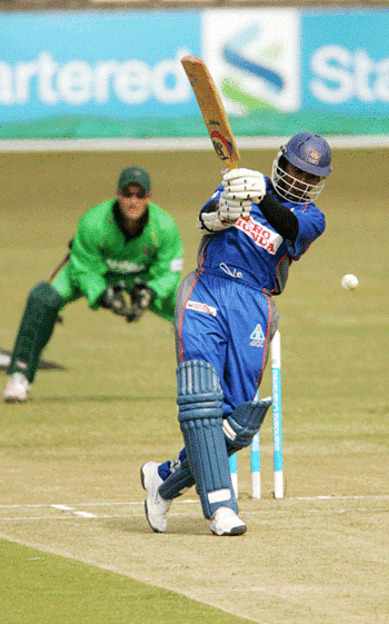 Kumar Sangakkara flays the attack during his half-century, Asia XI v Africa XI, Sahara Park Stadium, Durban, August 20